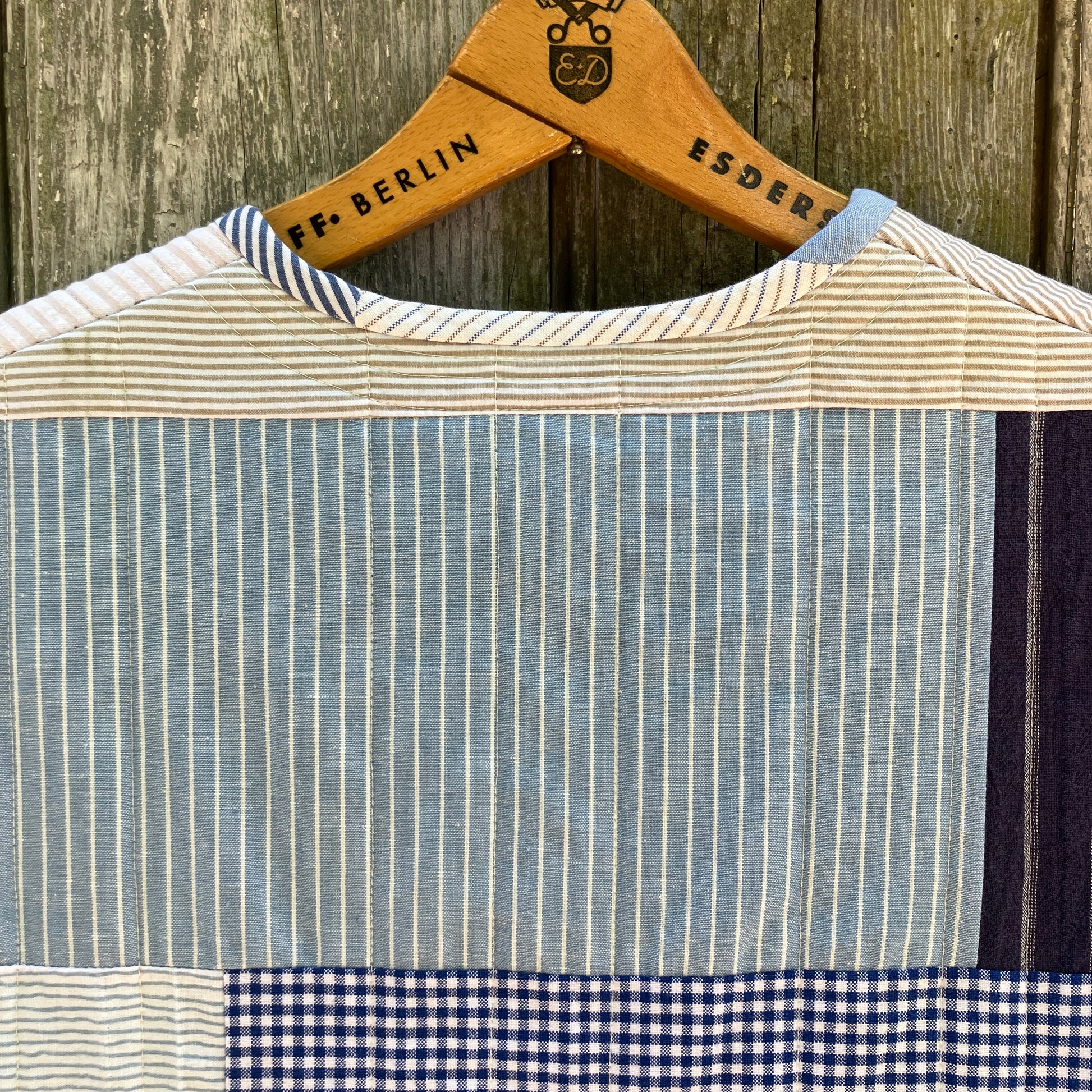 tie front quilted vest/waistcoat made from recycled men's cotton shirts in shades of blue