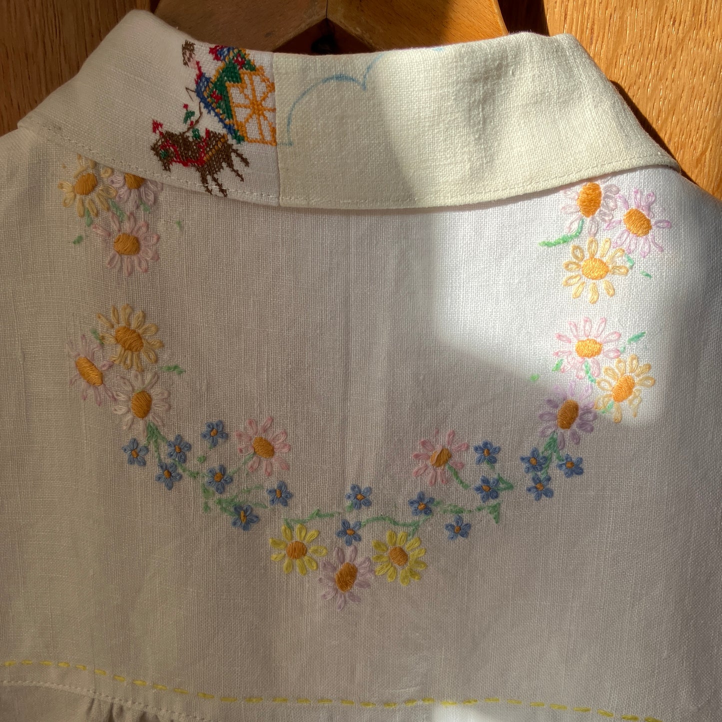 Patchwork shirt made from a selection of recycled embroidered vintage linen.