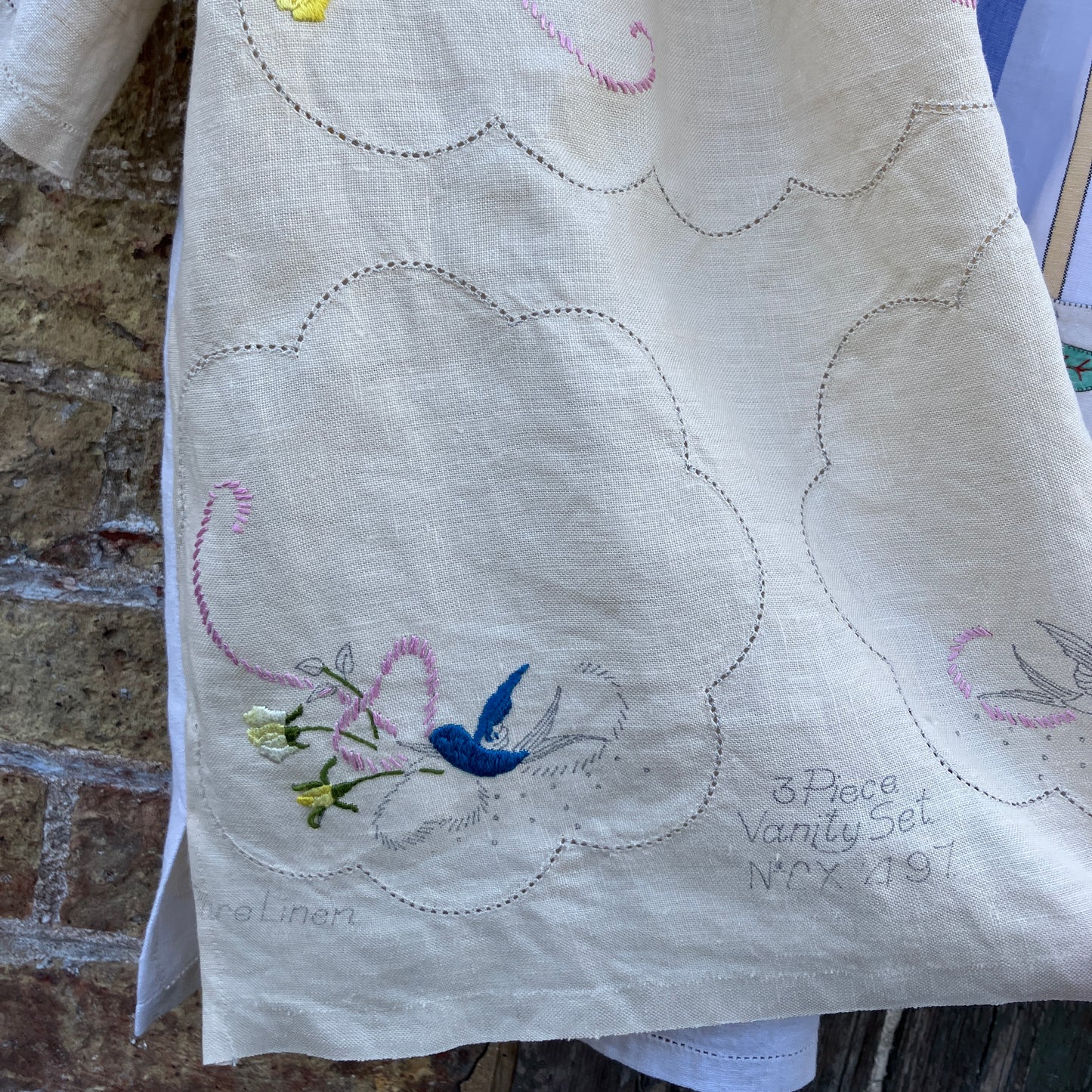 Patchwork shirt made from a selection of recycled embroidered vintage linen.