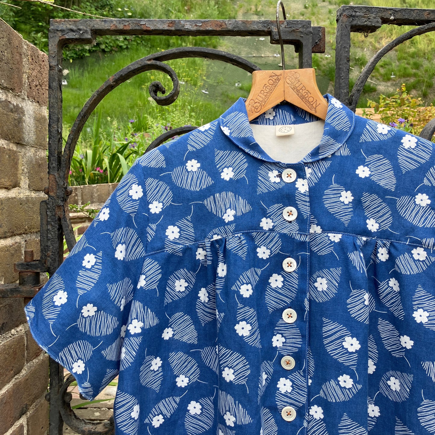 Blouse with mini collar made from blue and white reclaimed vintage floral print cotton