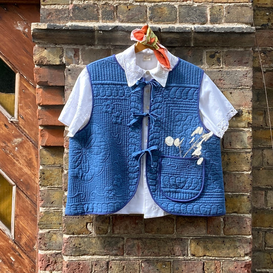indigo coloured tie front vest made from a reclaimed vintage quilt