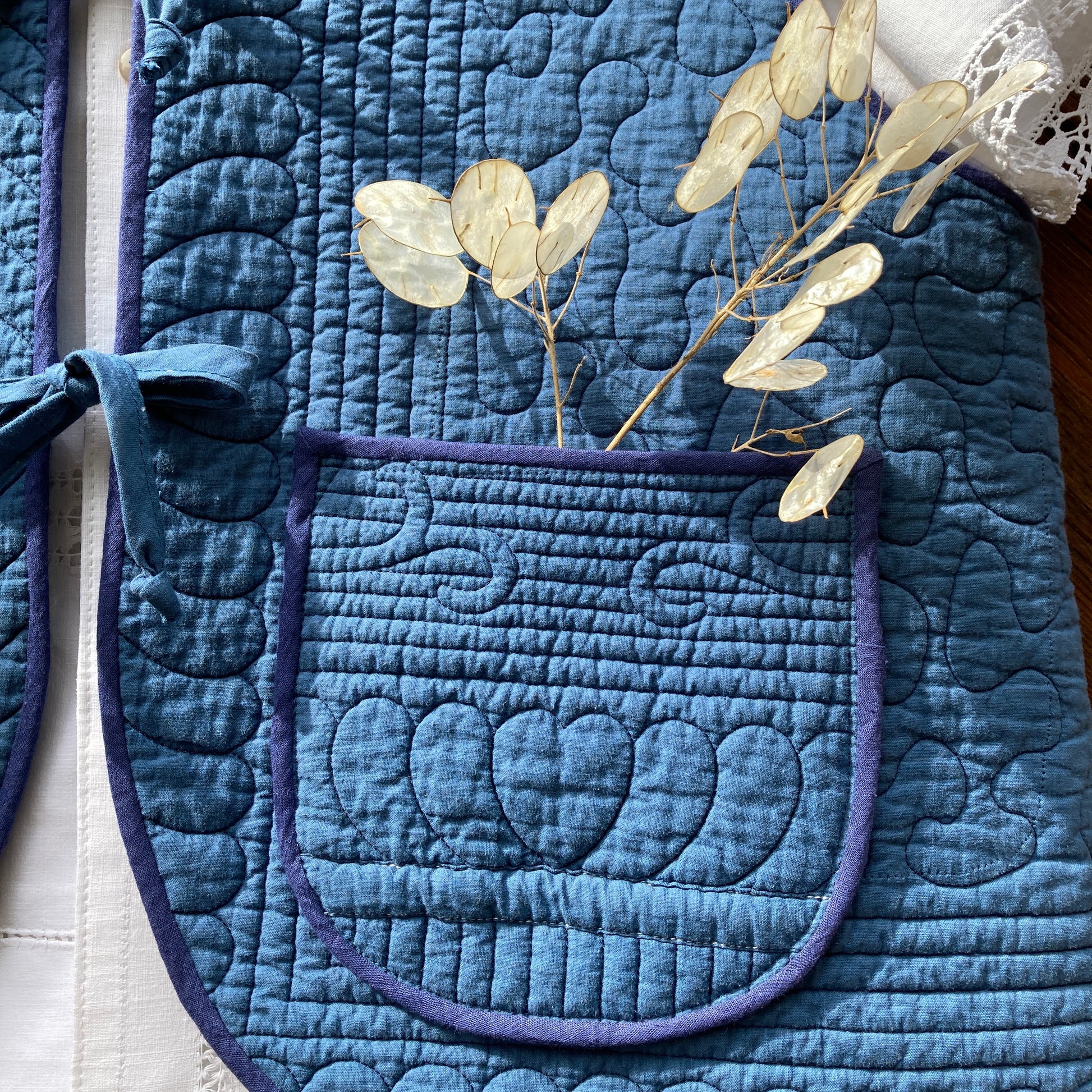 indigo coloured tie front vest made from a reclaimed vintage quilt