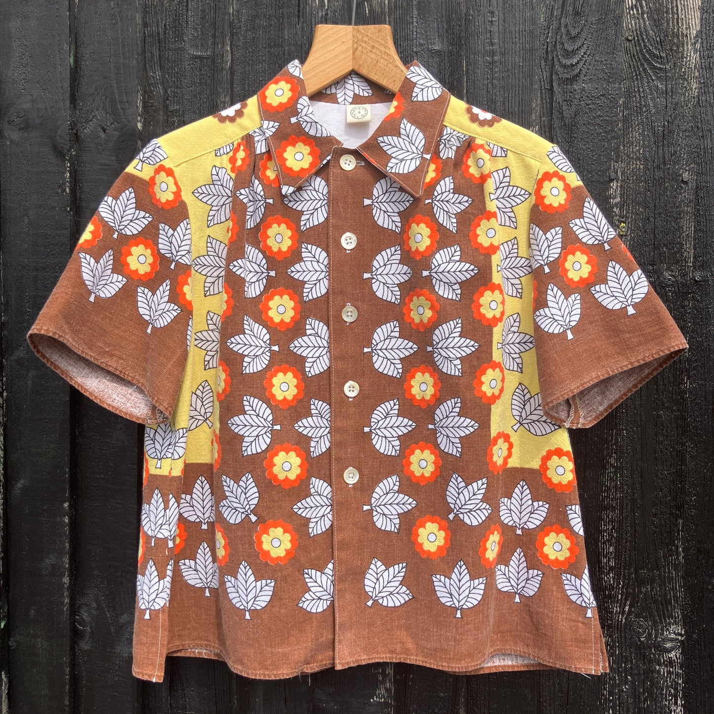 Shirt made from a brown, orange and yellow 70s vintage tablecloth