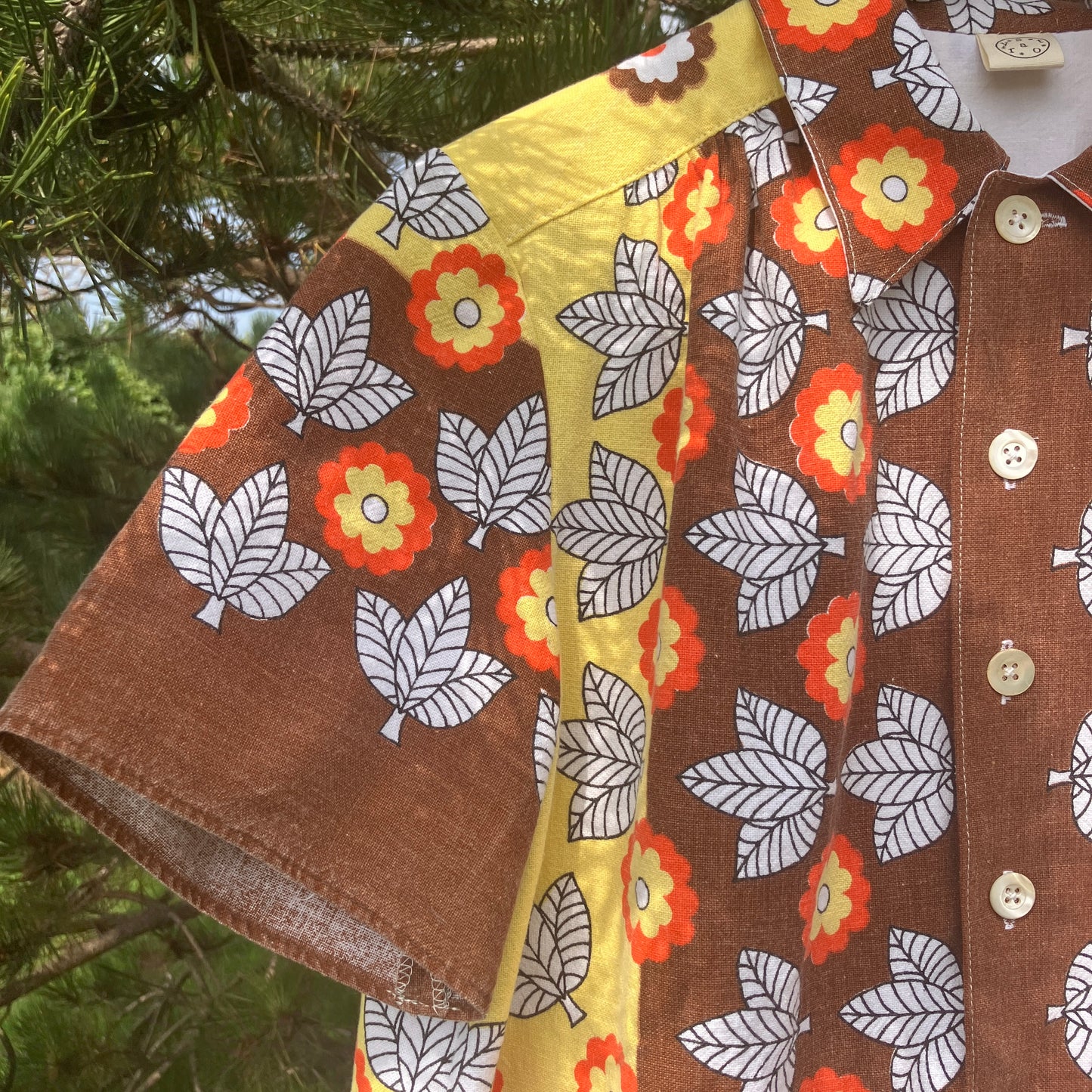Shirt made from a brown, orange and yellow 70s vintage tablecloth