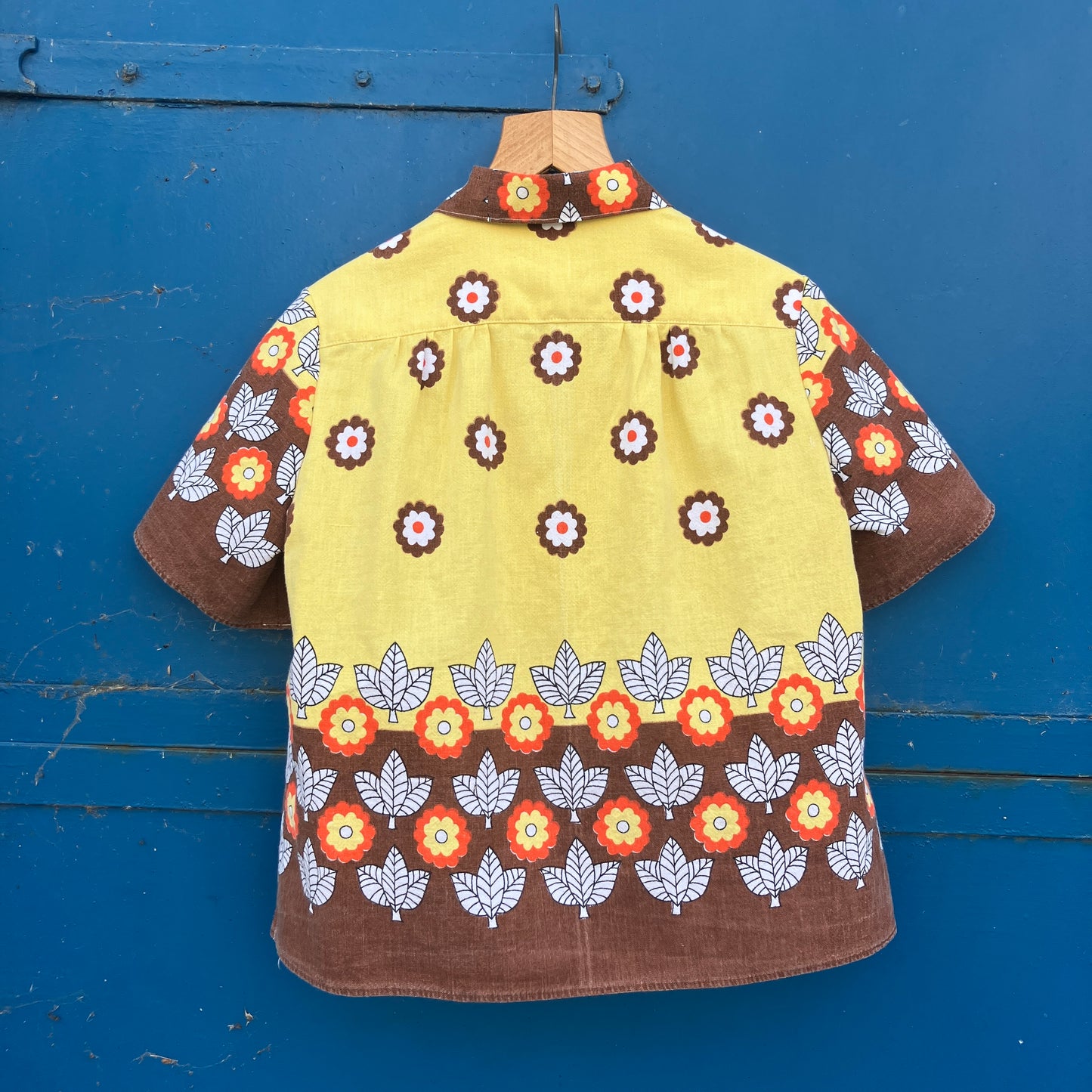 Shirt made from a brown, orange and yellow 70s vintage tablecloth