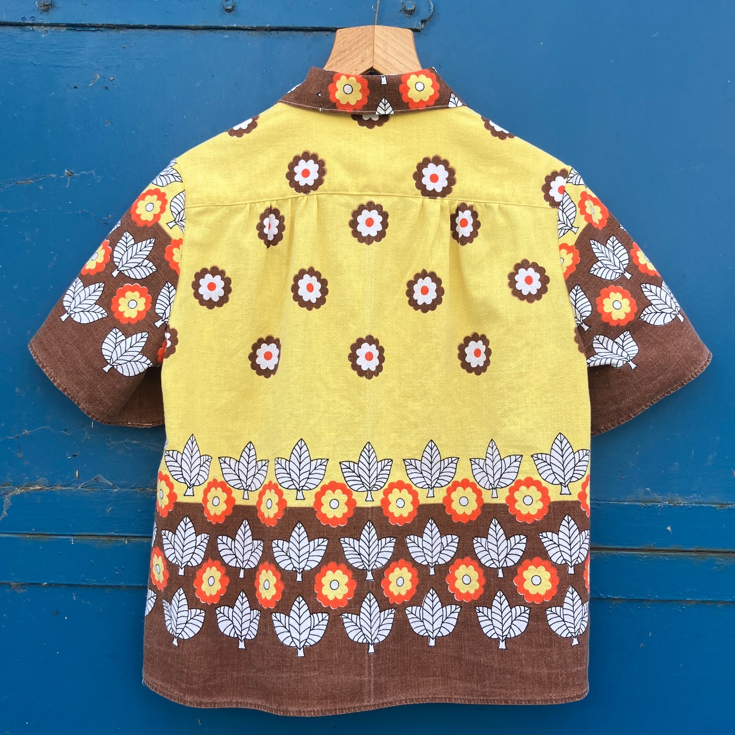 Shirt made from a brown, orange and yellow 70s vintage tablecloth