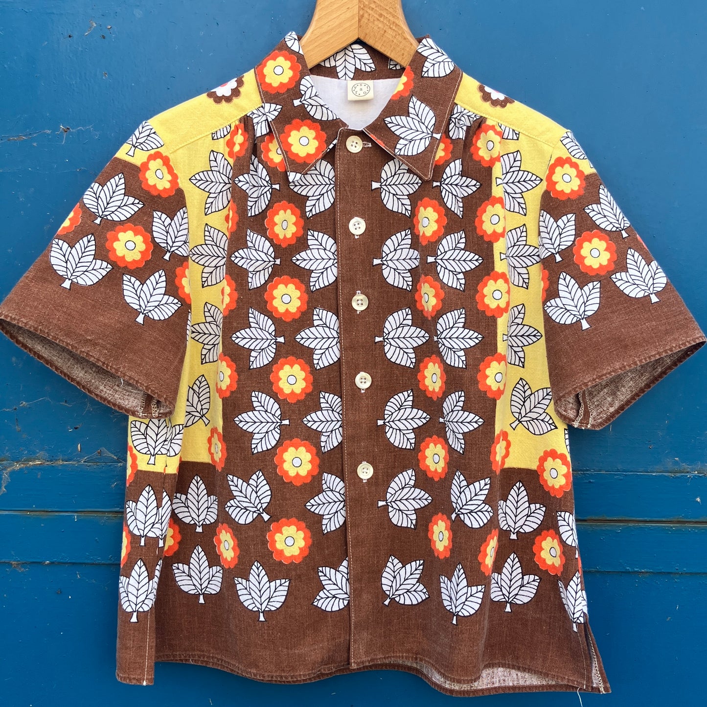 Shirt made from a brown, orange and yellow 70s vintage tablecloth