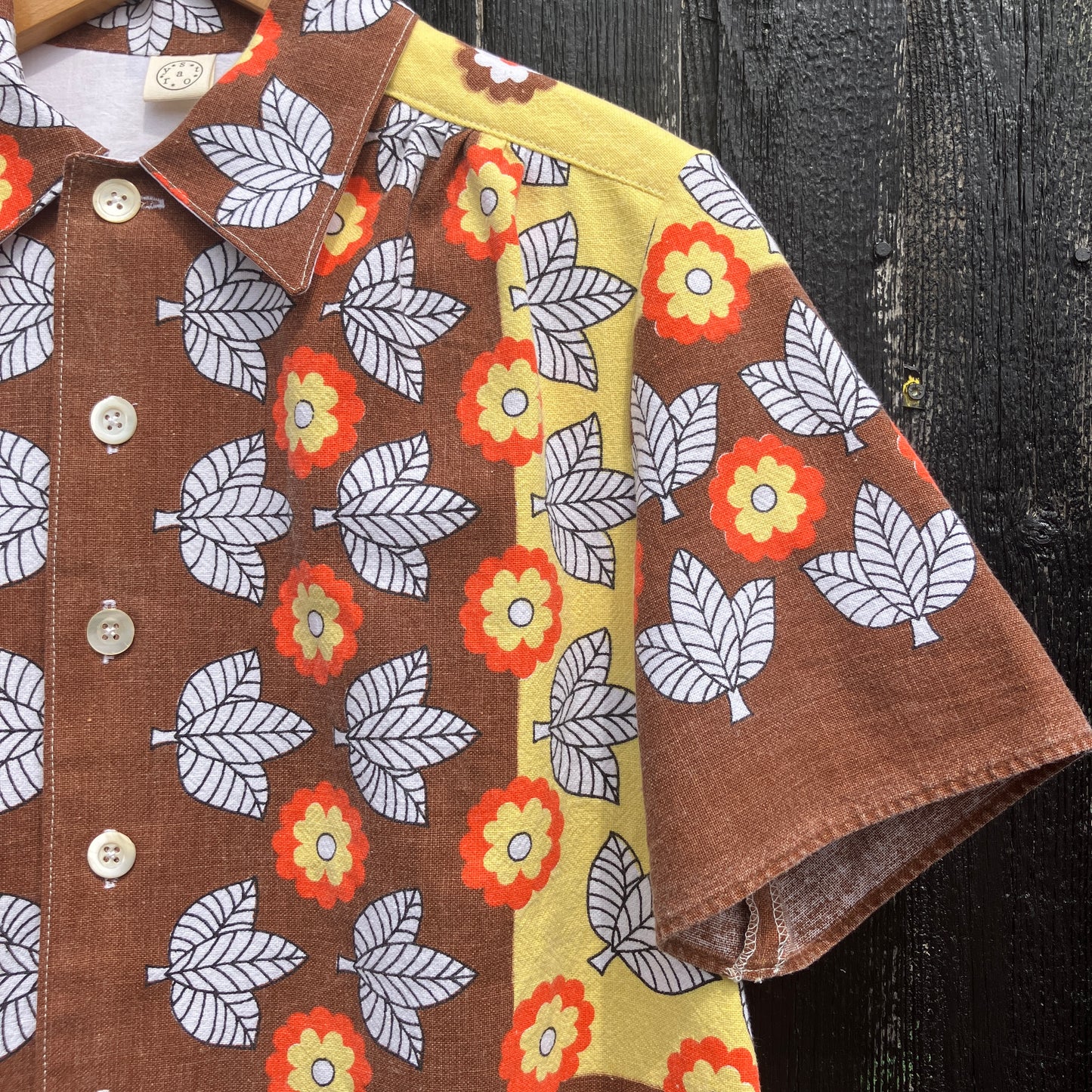 Shirt made from a brown, orange and yellow 70s vintage tablecloth
