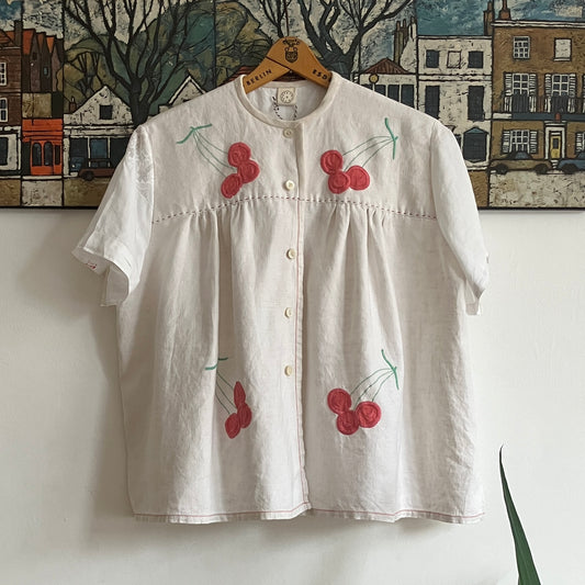Top made from a patchwork of a recycled linen tablecloth with cherry motifs and antique bed linen