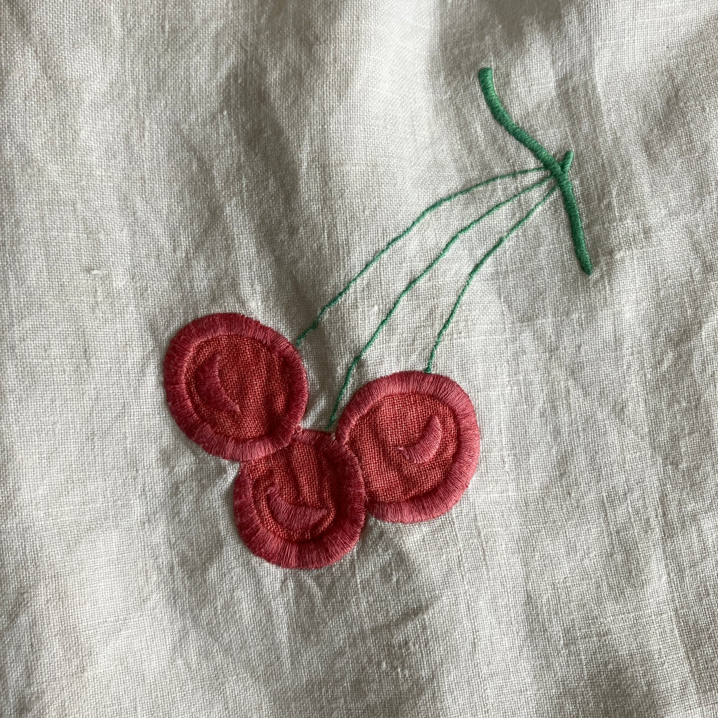 Top made from a patchwork of a recycled linen tablecloth with cherry motifs and antique bed linen