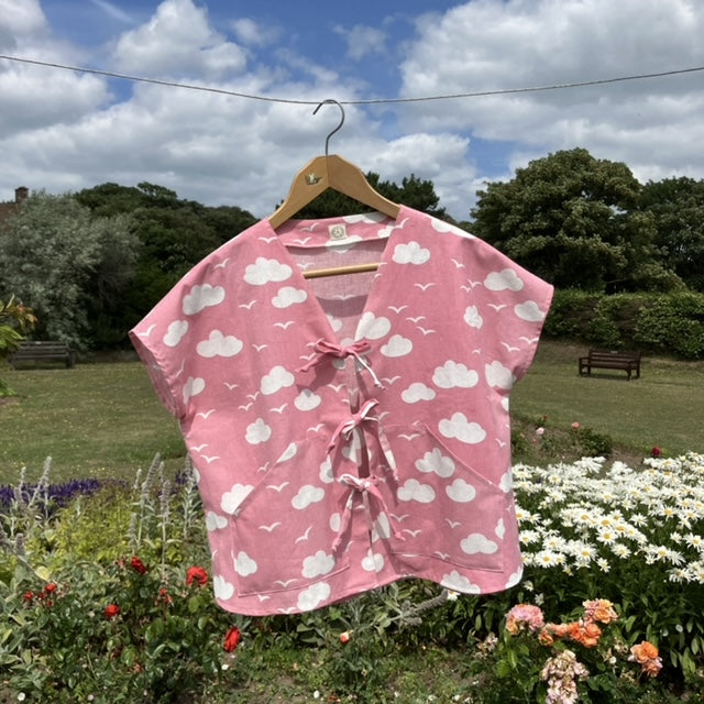 Boxy-fit tie-front top made from a repurposed vintage pink 1980s cloud-print curtain