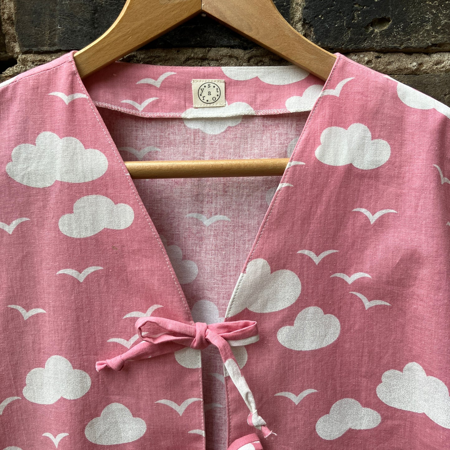 Boxy-fit tie-front top made from a repurposed vintage pink 1980s cloud-print curtain