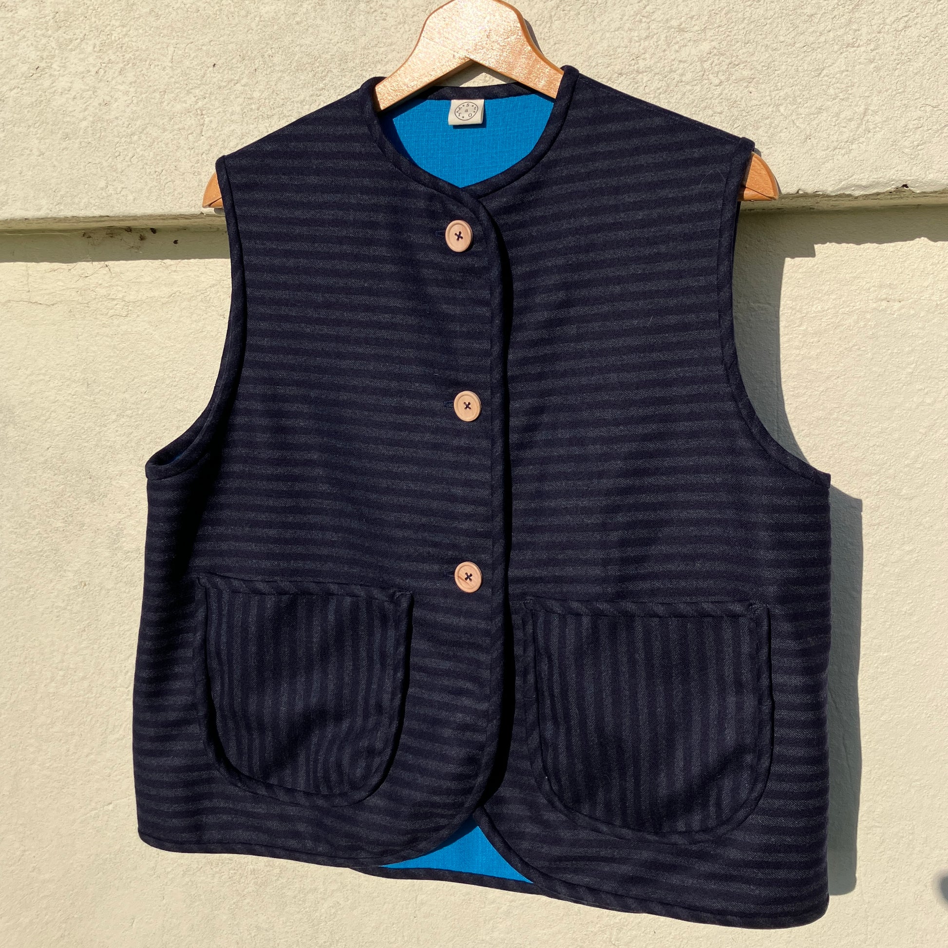 Beautiful quality vintage deadstock blue striped wool vest with found wooden buttons