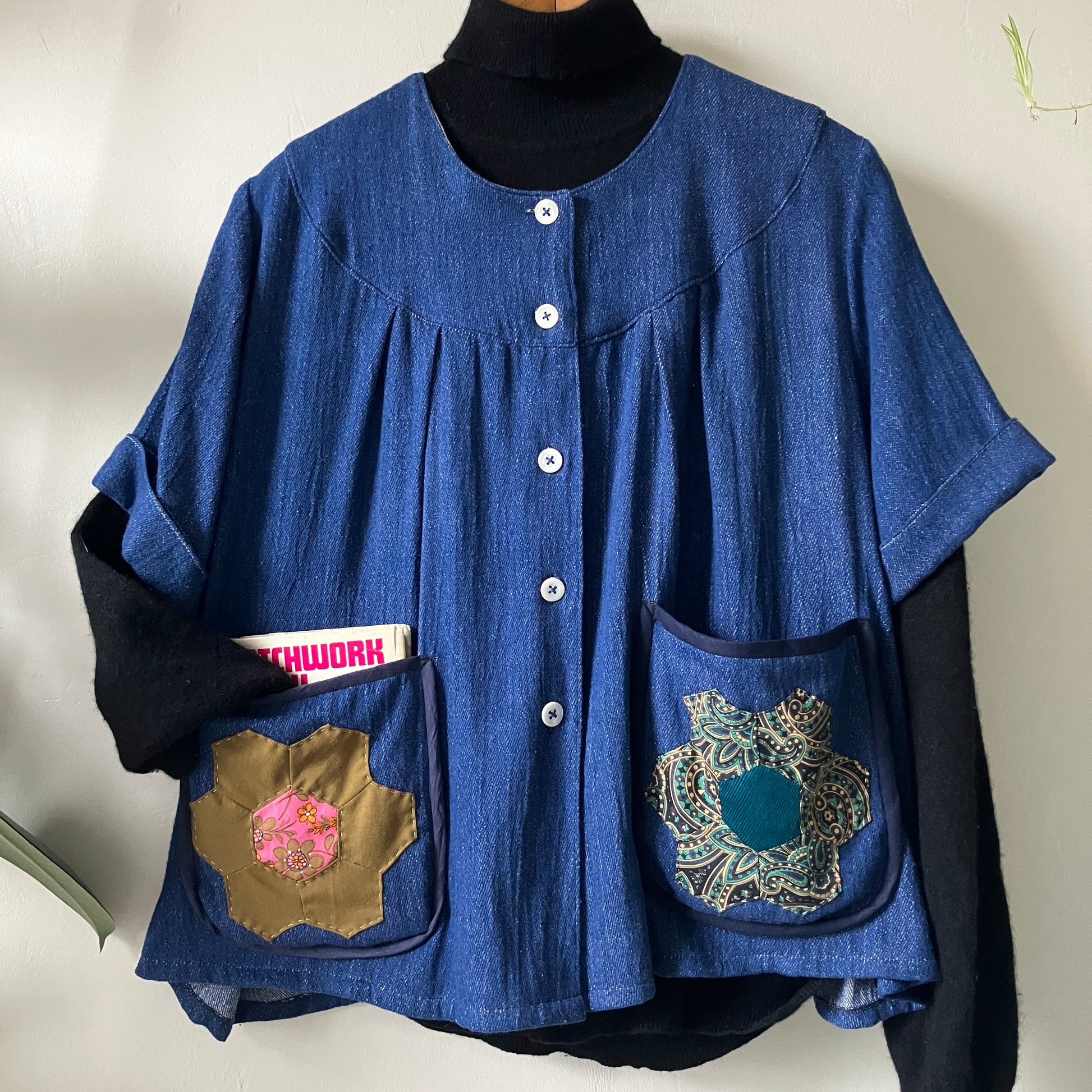 Smock top hand made from deadstock denim with thrifted patchwork hexagons on the pockets
