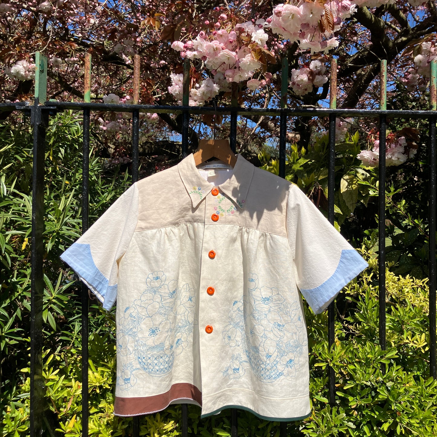 shirt made from vintage cross stitch flowers recycled linen panel