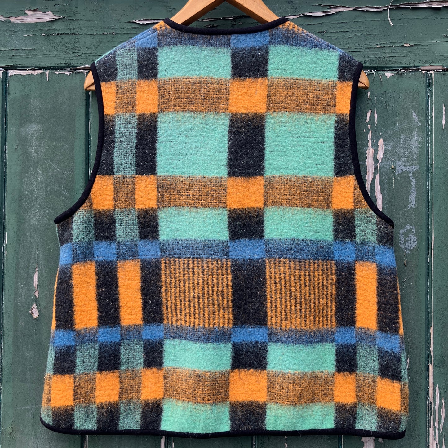 Cosy vest made from a recycled checked wool blanket