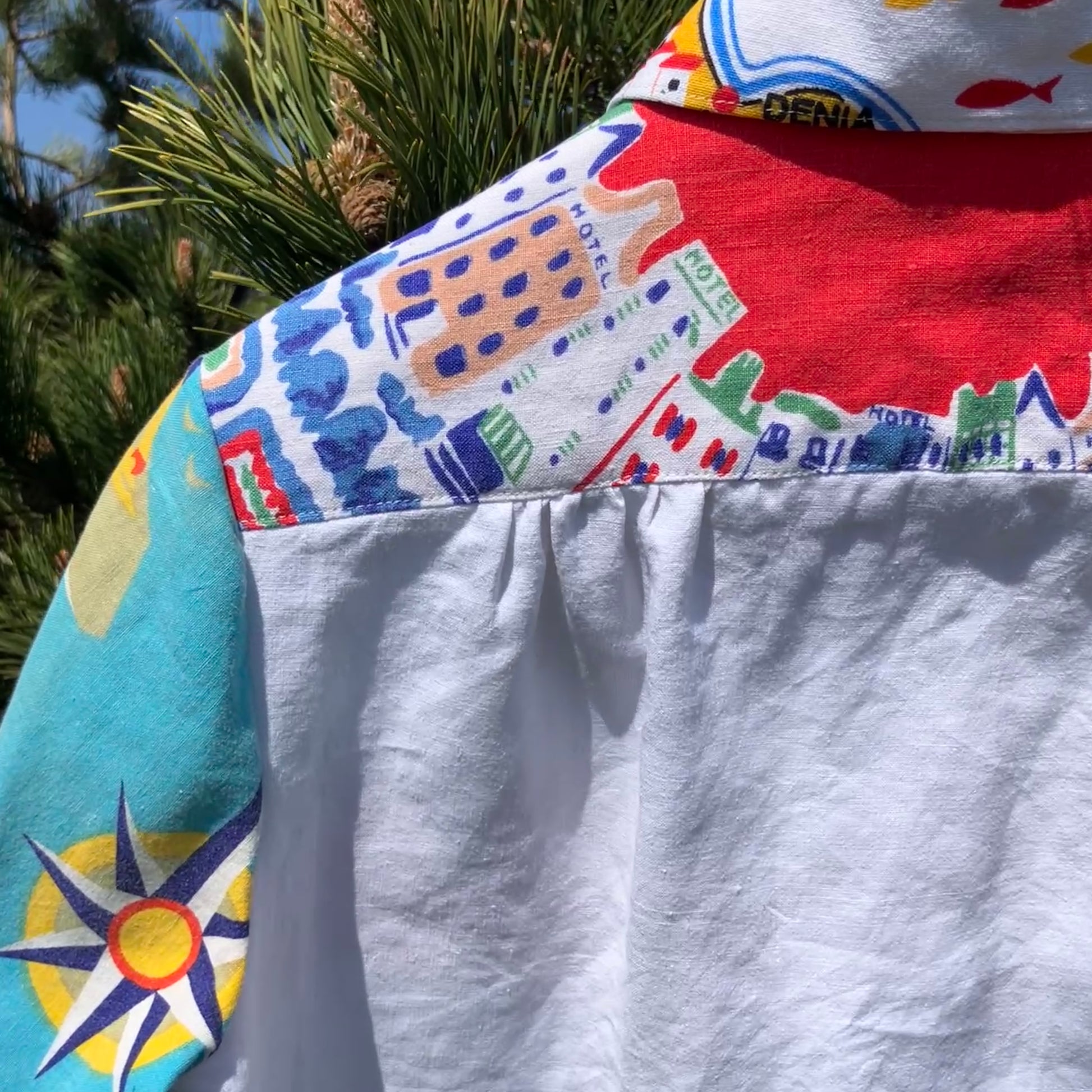 Holiday shirt made from an upcycled beach scenes linen tablecloth