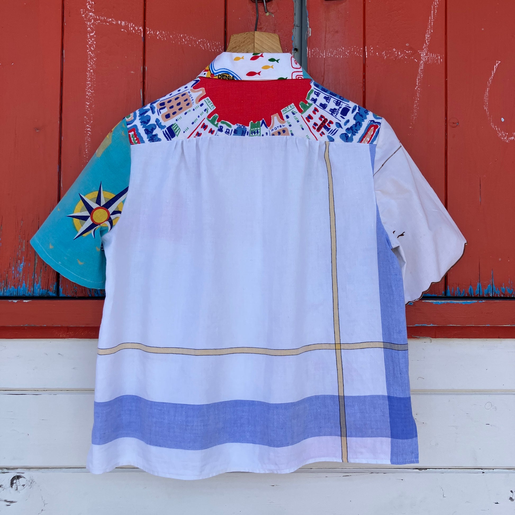 Holiday shirt made from an upcycled beach scenes linen tablecloth
