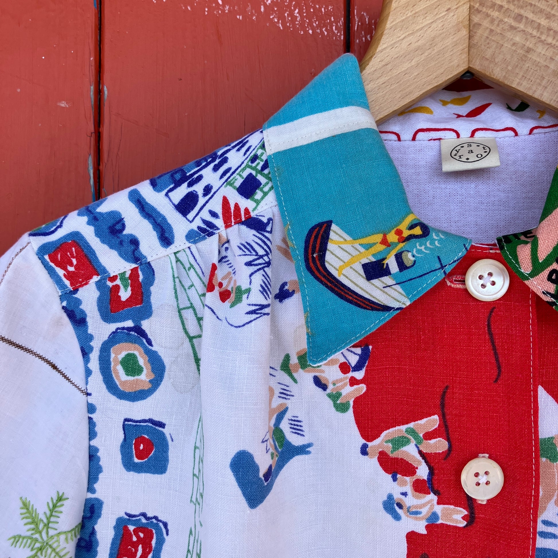 Holiday shirt made from an upcycled beach scenes linen tablecloth