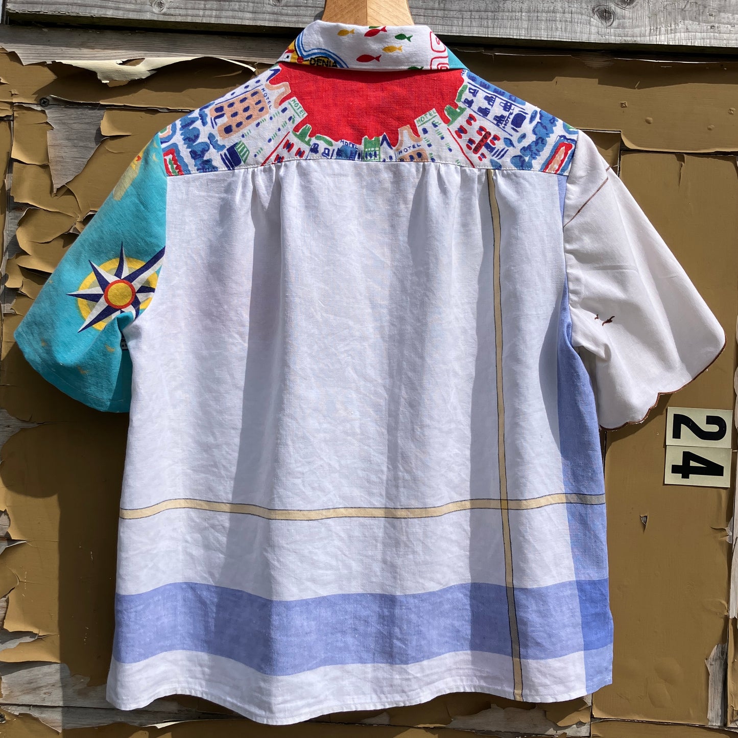 Holiday shirt made from an upcycled beach scenes linen tablecloth