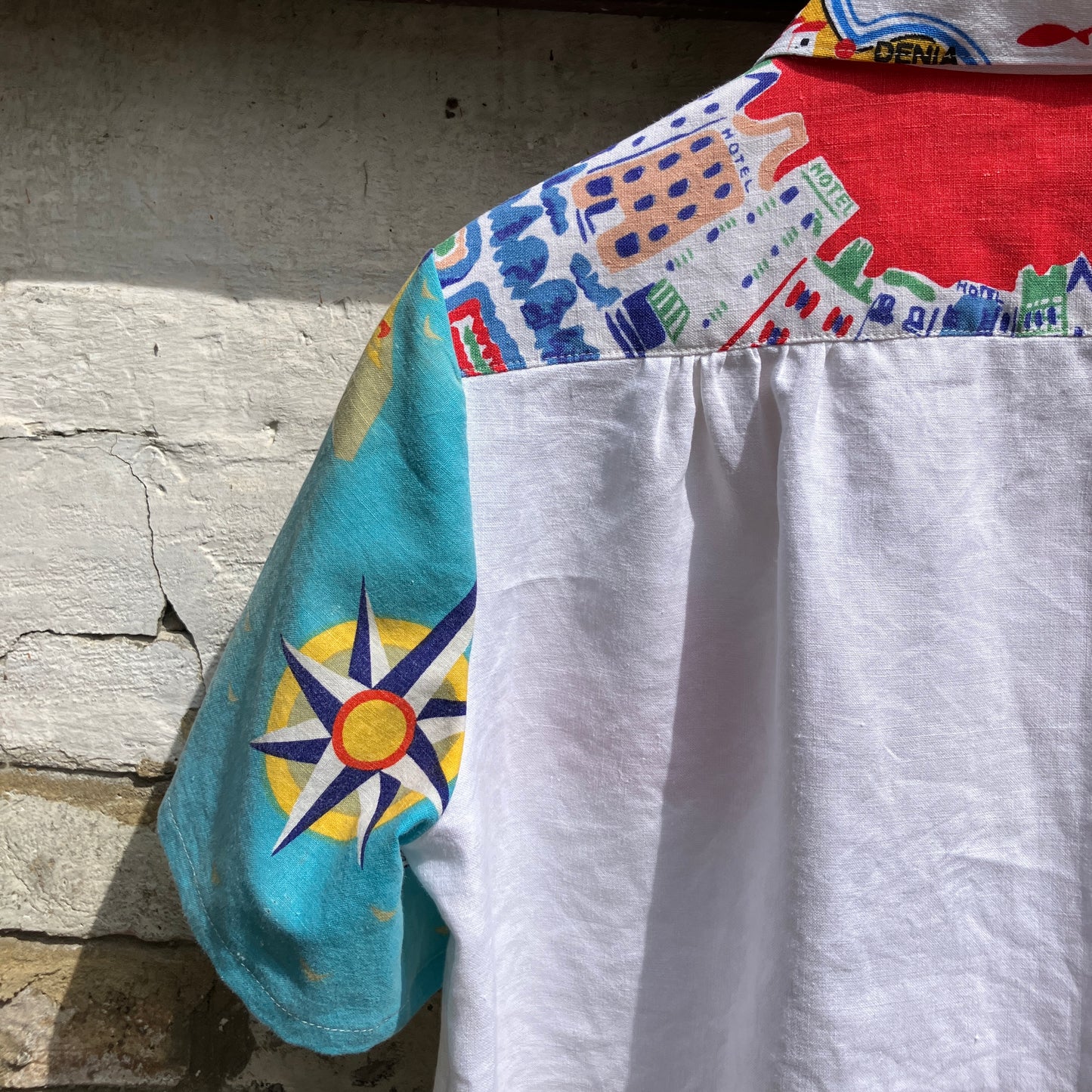Holiday shirt made from an upcycled beach scenes linen tablecloth