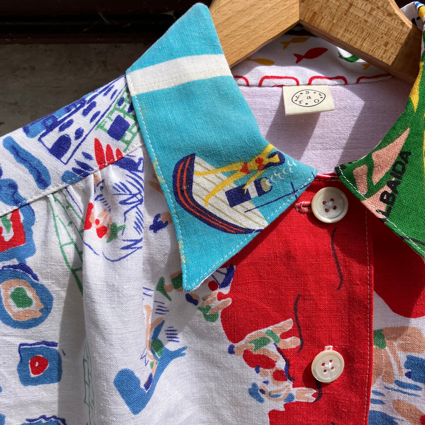Holiday shirt made from an upcycled beach scenes linen tablecloth