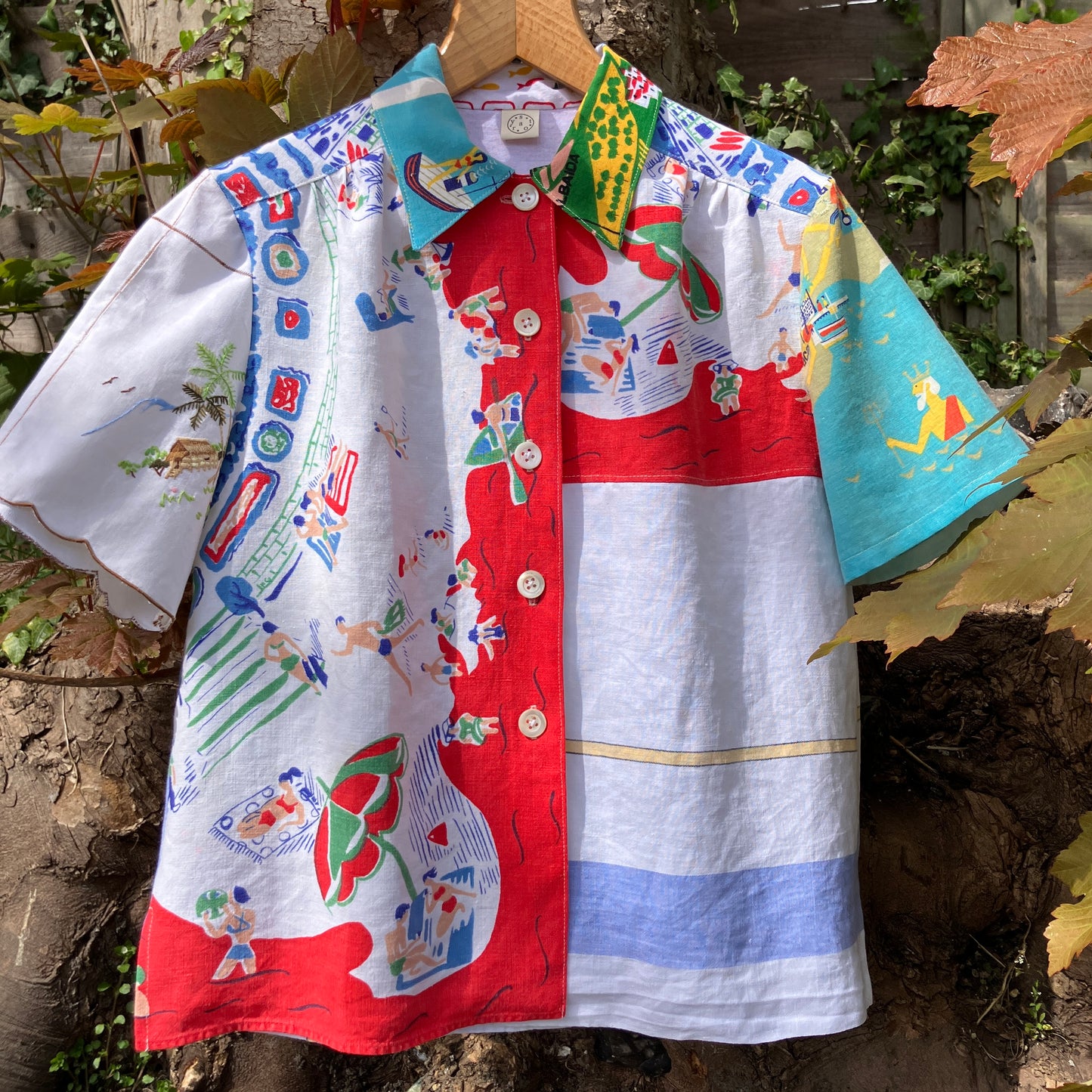 Holiday shirt made from an upcycled beach scenes linen tablecloth