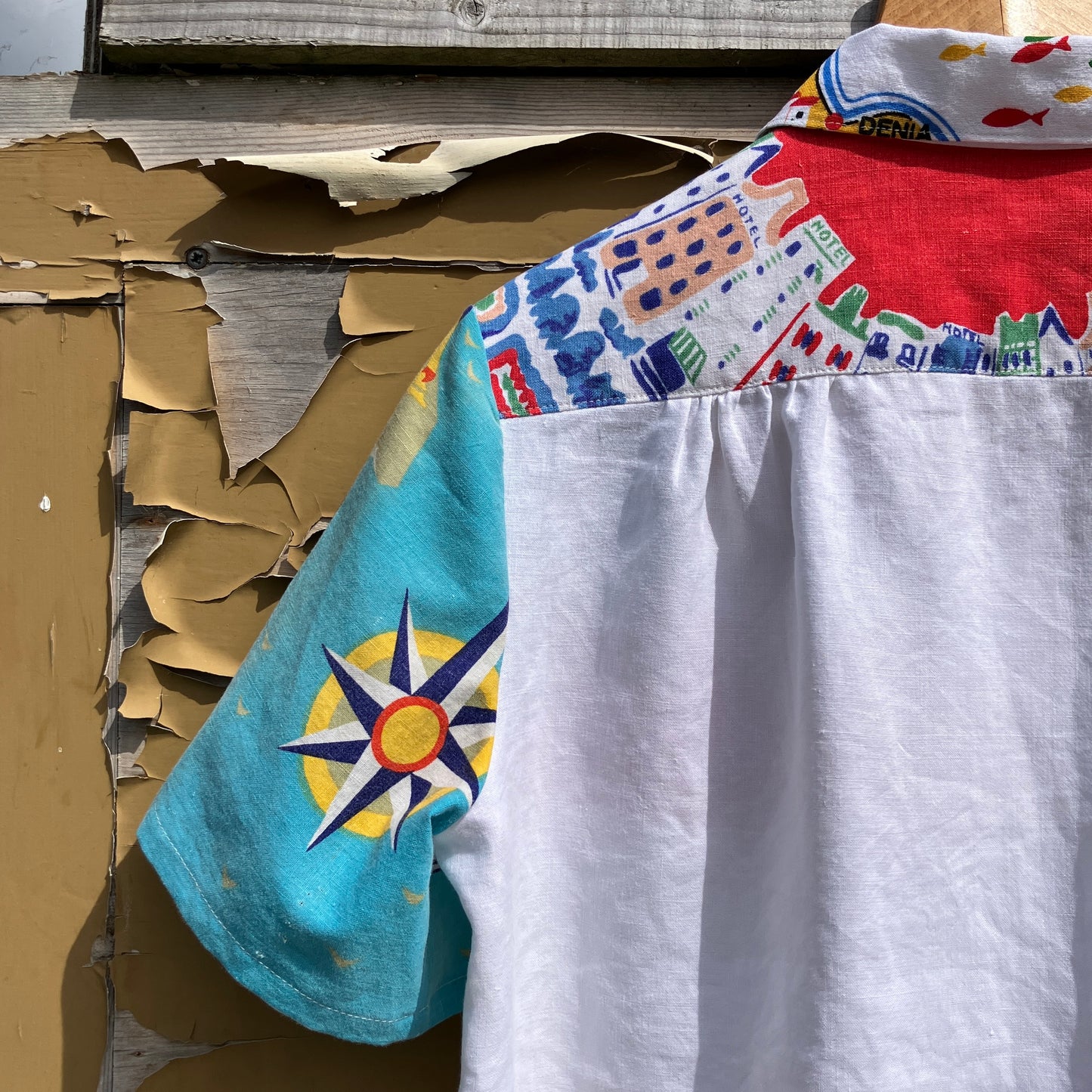 Holiday shirt made from an upcycled beach scenes linen tablecloth