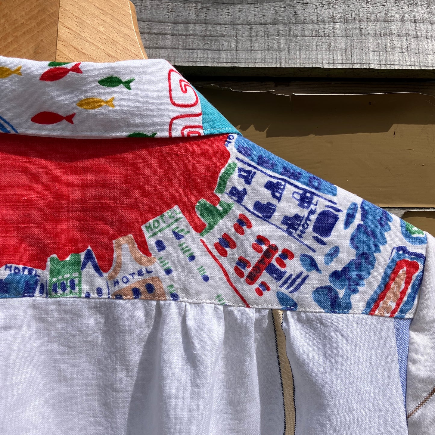 Holiday shirt made from an upcycled beach scenes linen tablecloth