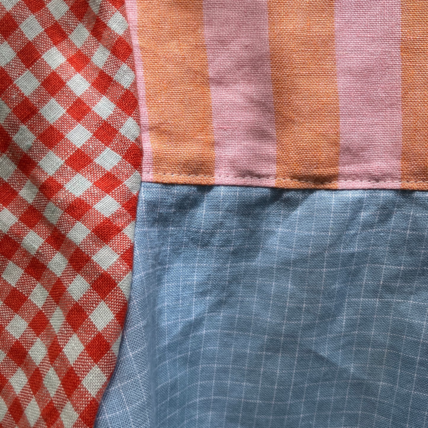 Multicoloured patchwork shirt made from a variety of checked and striped linen offcuts