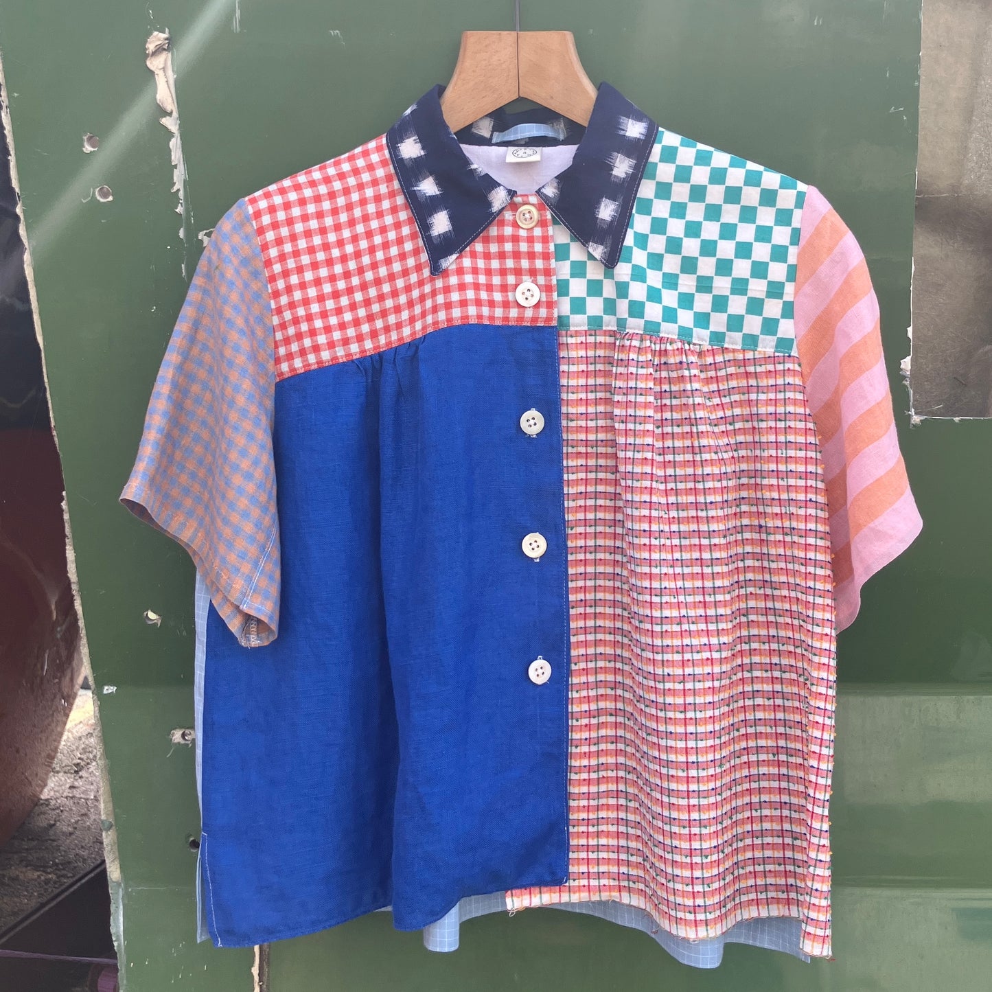 Multicoloured patchwork shirt made from a variety of checked and striped linen offcuts