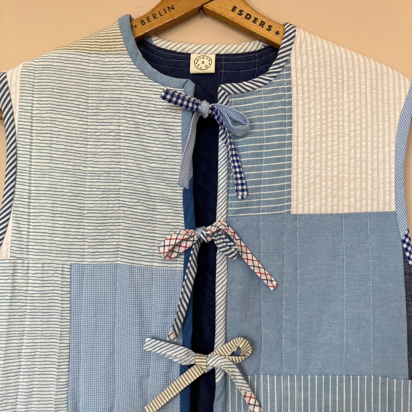tie front quilted vest/waistcoat made from recycled men's cotton shirts in shades of blue