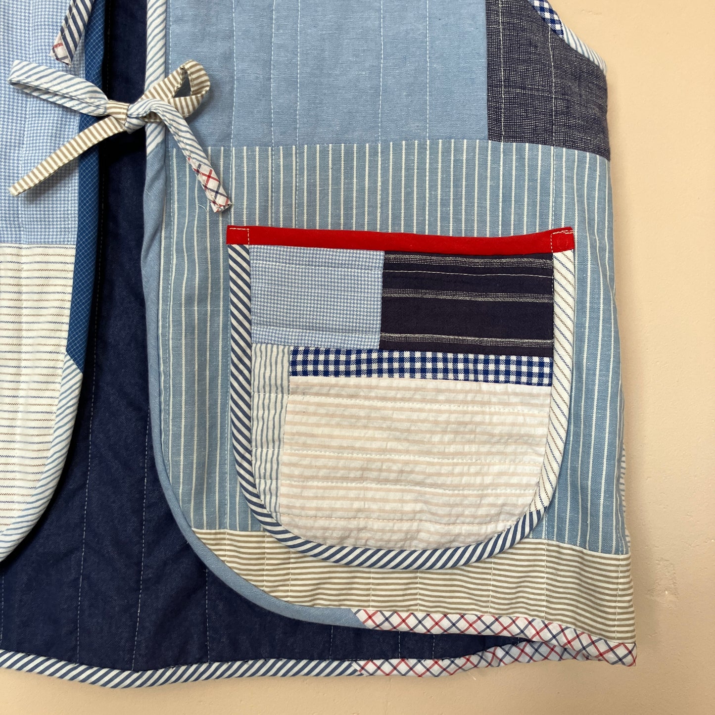 tie front quilted vest/waistcoat made from recycled men's cotton shirts in shades of blue
