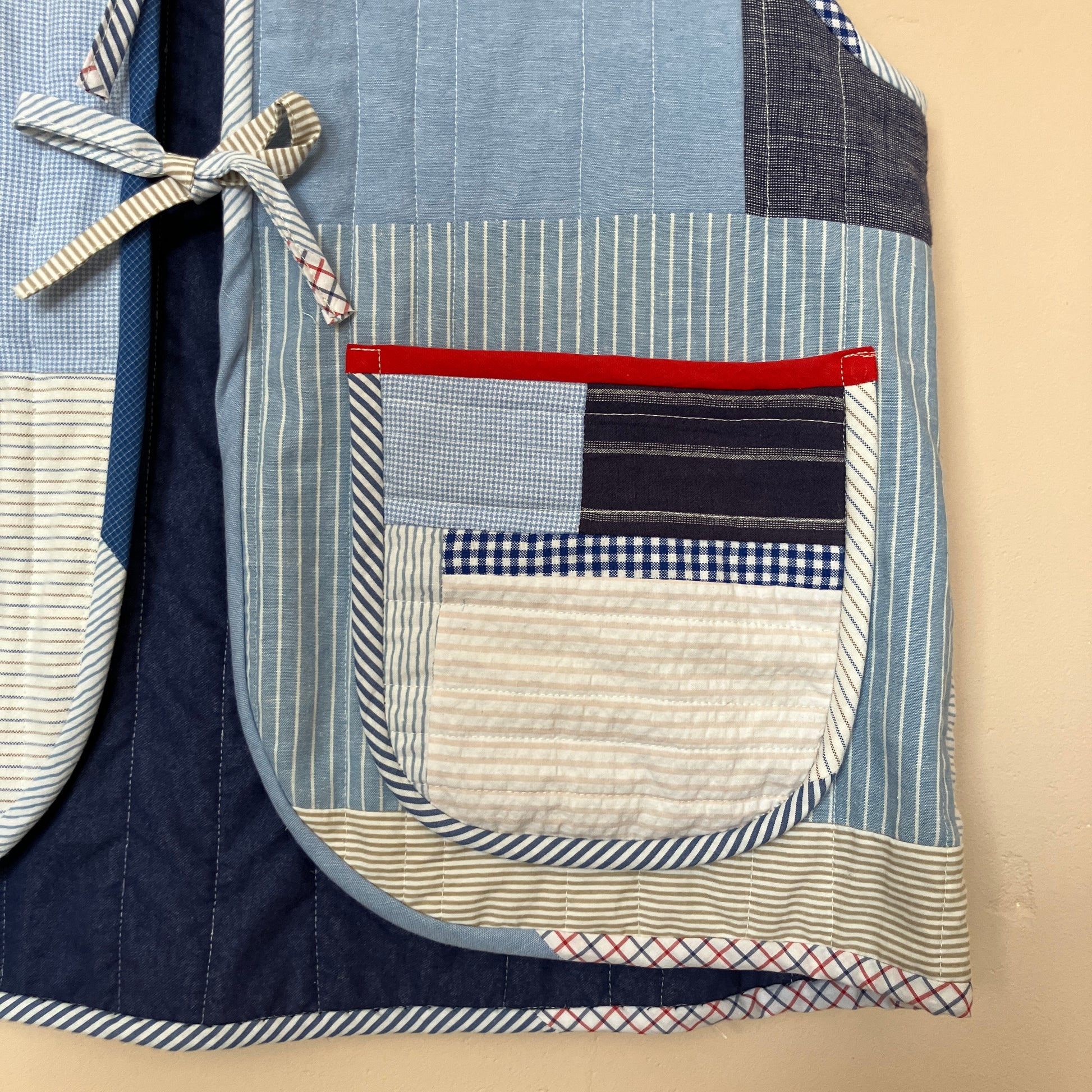 tie front quilted vest/waistcoat made from recycled men's cotton shirts in shades of blue