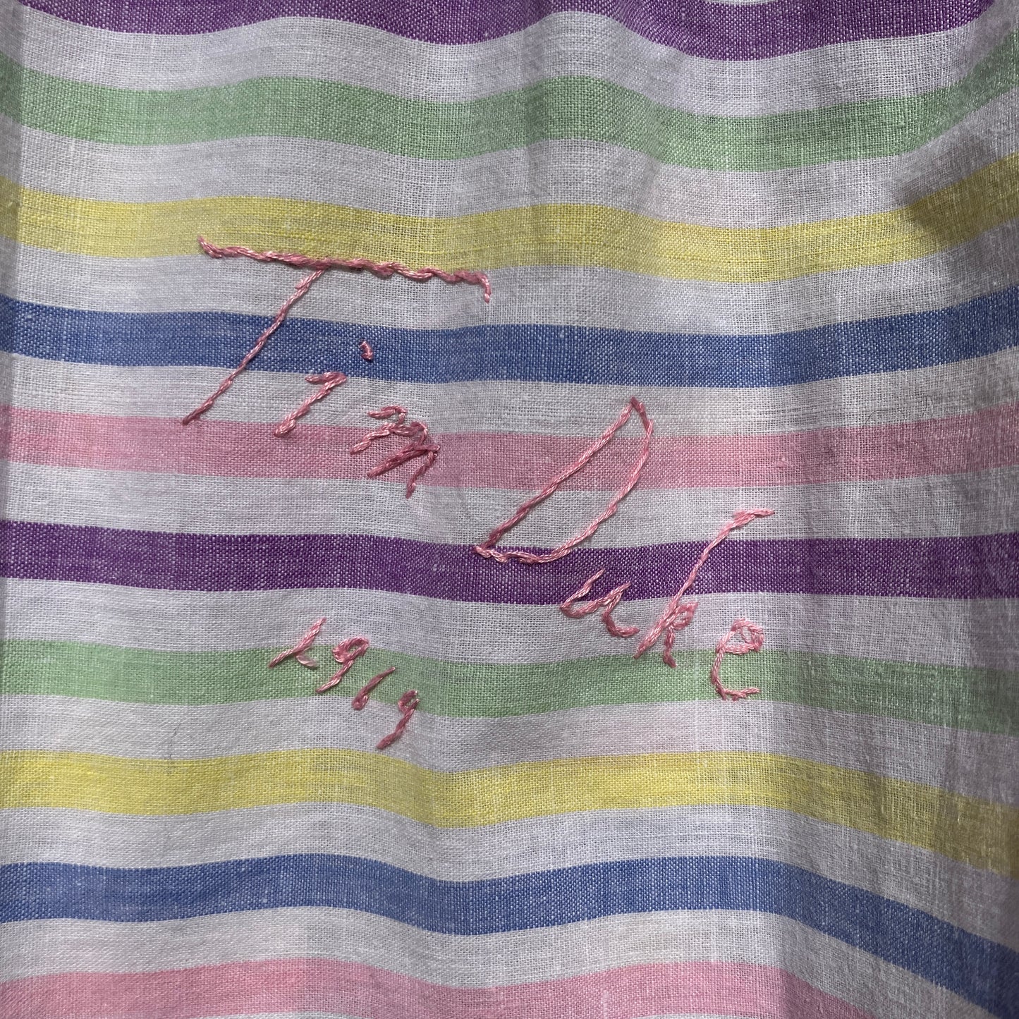Totally unique ruffle shirt made from a soft cotton reclaimed vintage candy stripe bedsheet adorned with embroidered signatures!