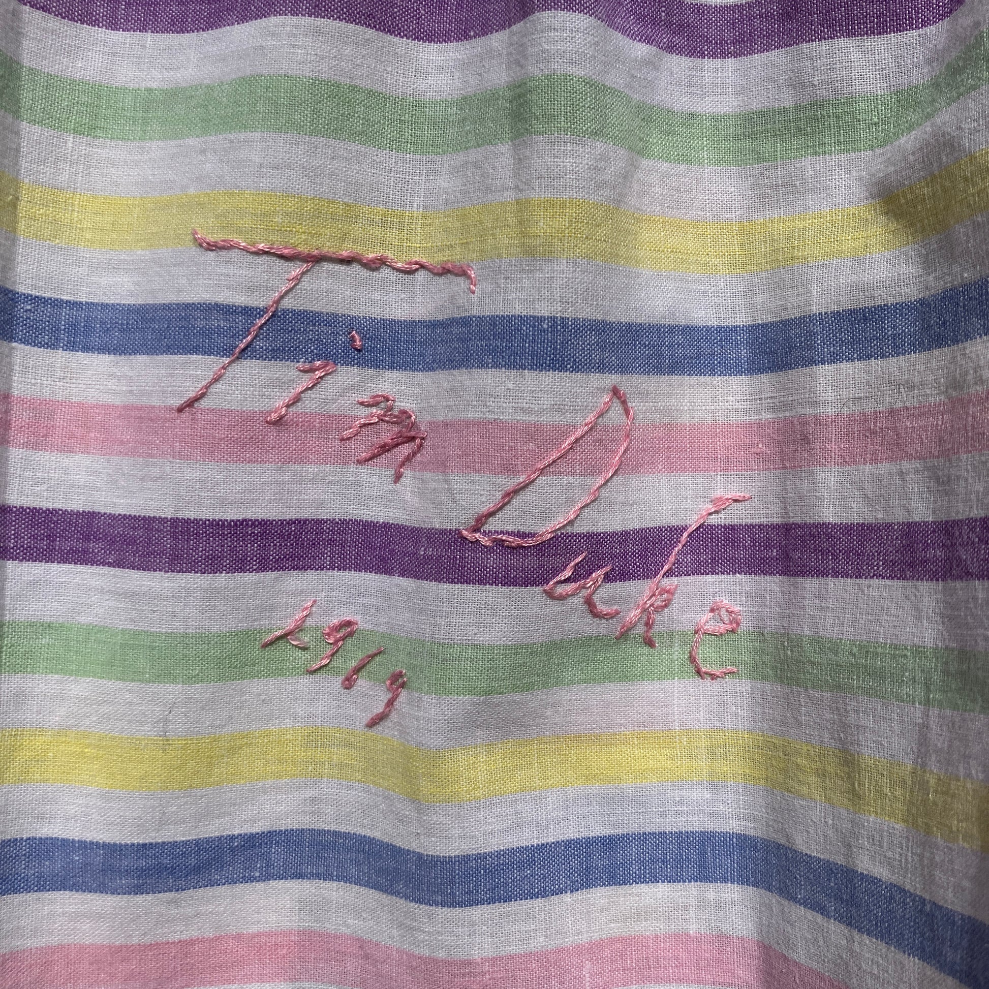 Totally unique ruffle shirt made from a soft cotton reclaimed vintage candy stripe bedsheet adorned with embroidered signatures!