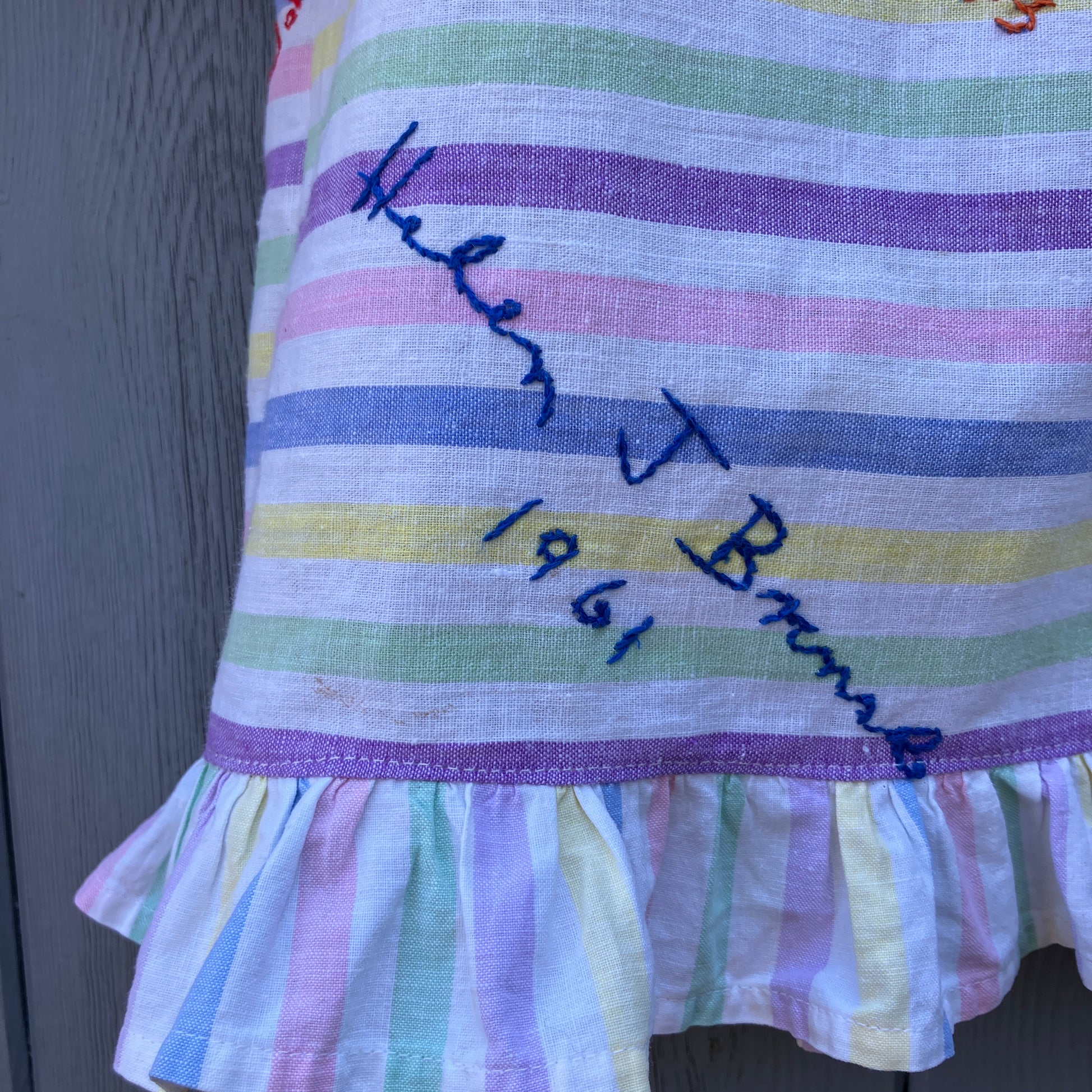 Totally unique ruffle shirt made from a soft cotton reclaimed vintage candy stripe bedsheet adorned with embroidered signatures!