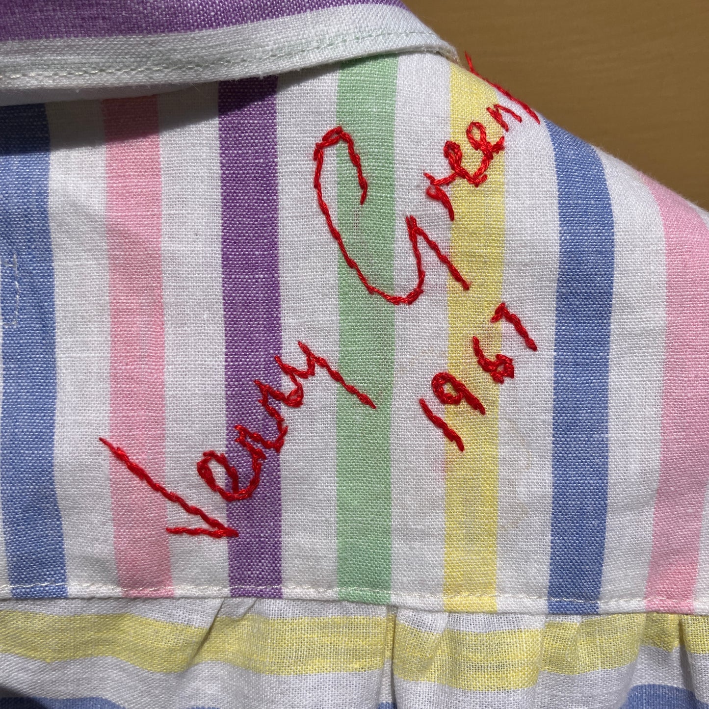 Totally unique ruffle shirt made from a soft cotton reclaimed vintage candy stripe bedsheet adorned with embroidered signatures!
