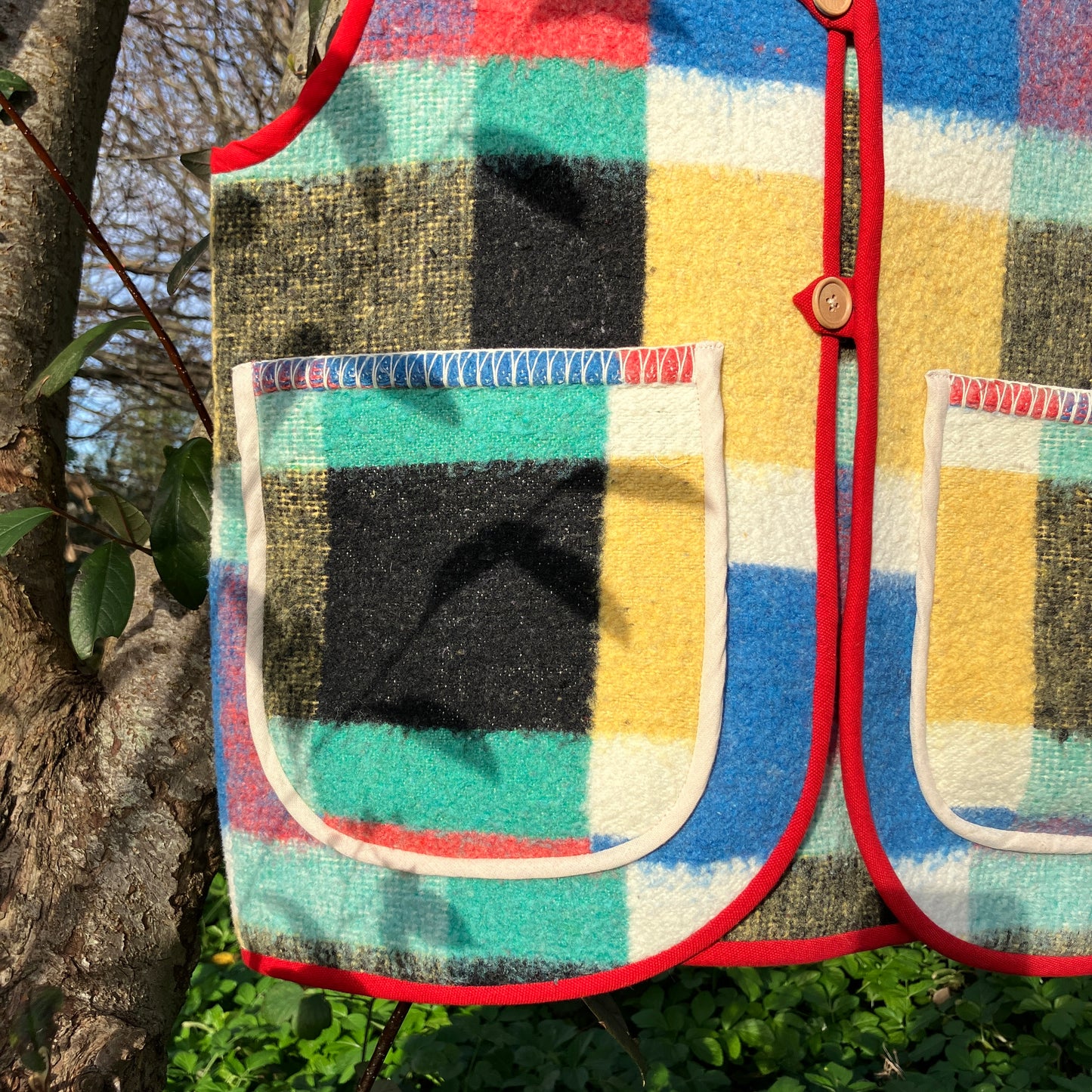 Multicoloured check recycled blanket vest