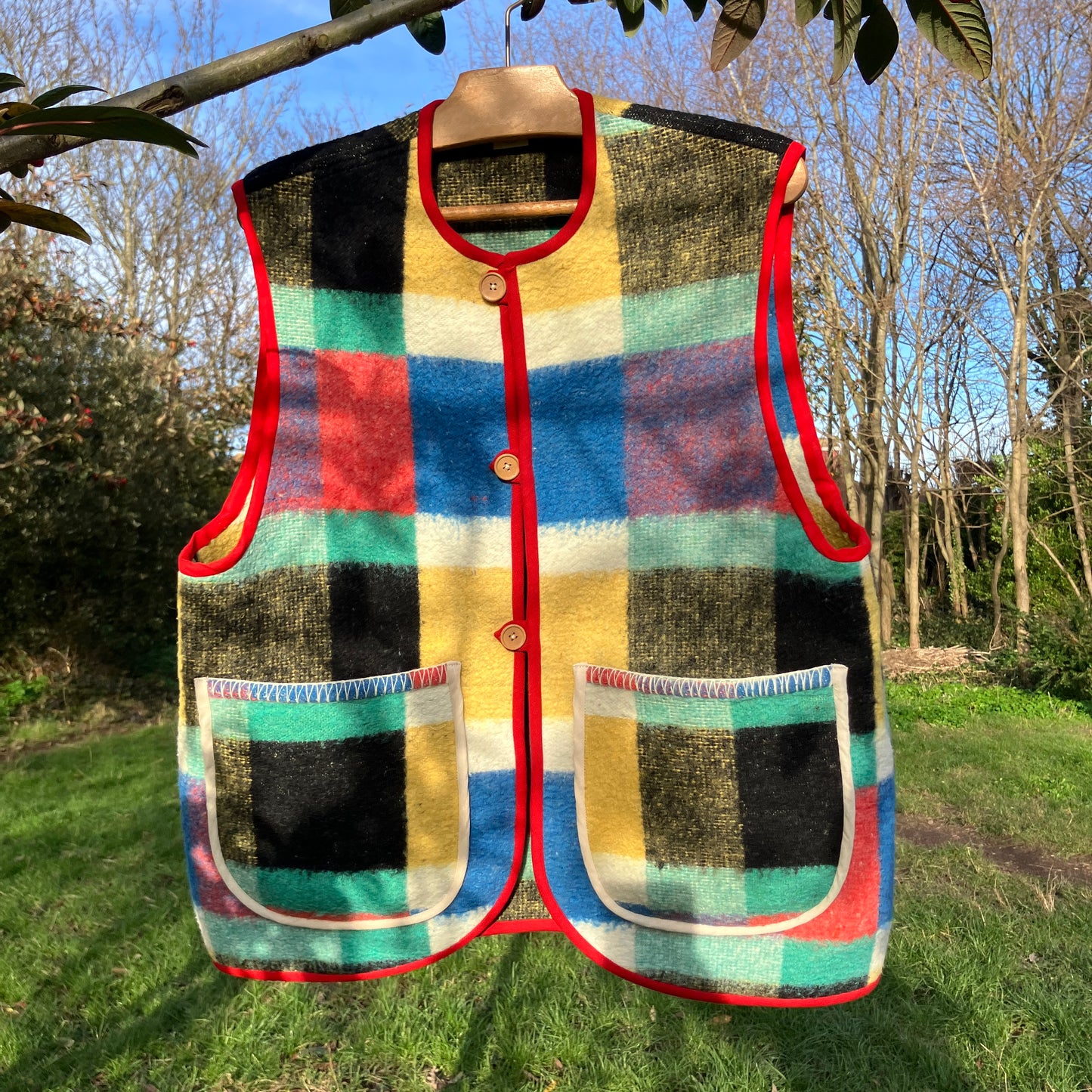 Multicoloured check recycled blanket vest