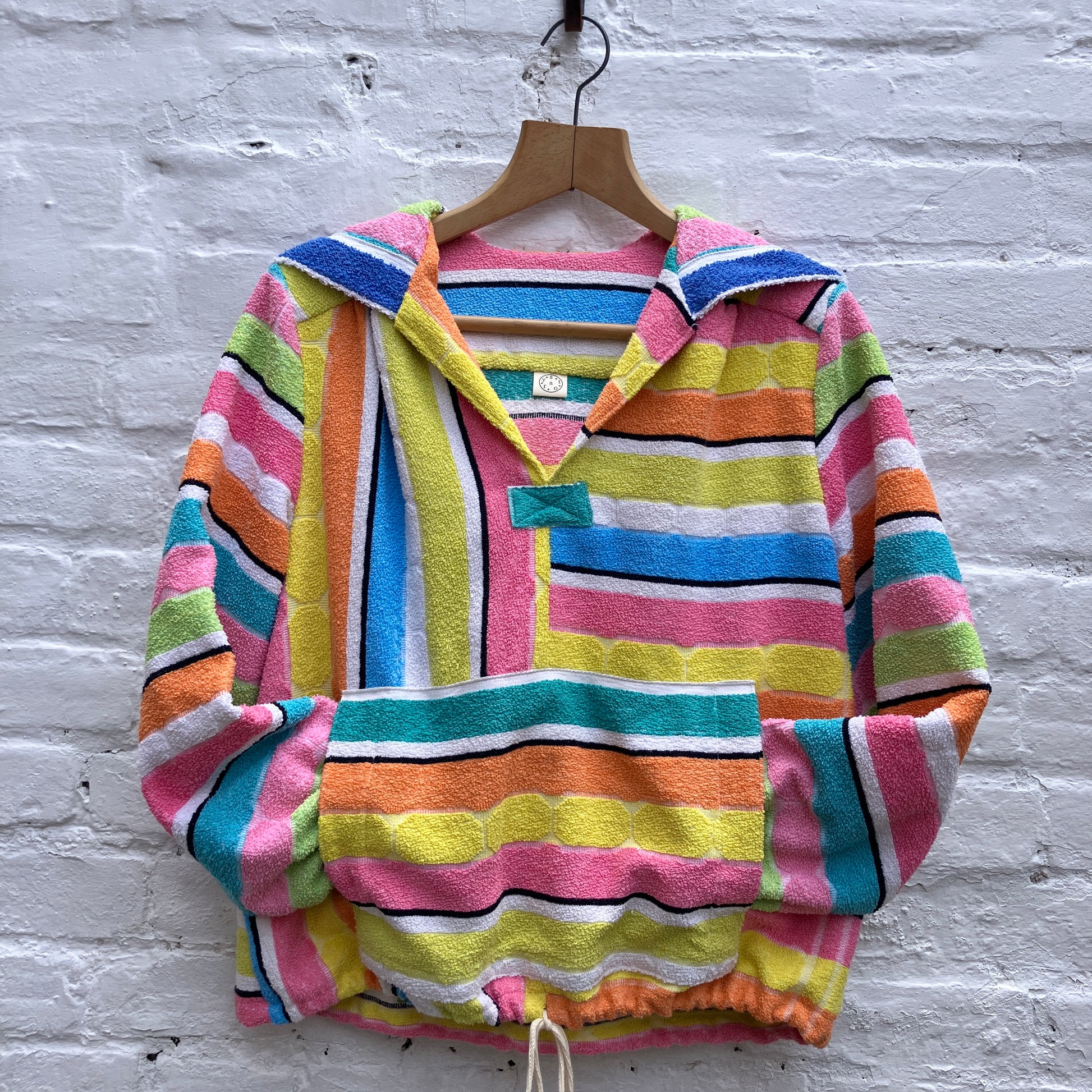 Beach jacket with hood made from two reclaimed 70s stripey towels