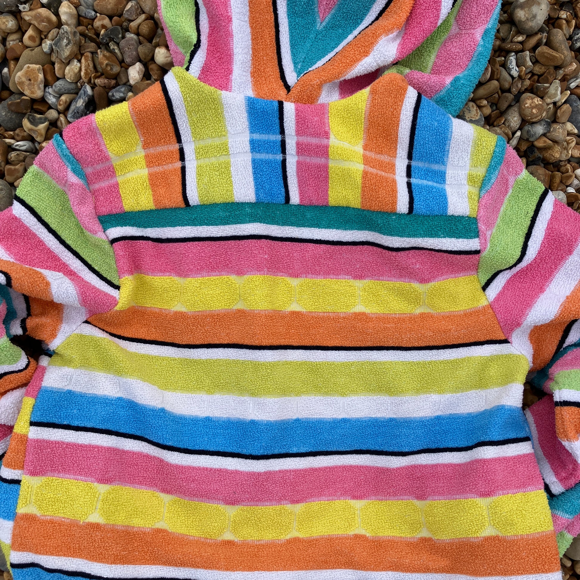 Beach jacket with hood made from two reclaimed 70s stripey towels