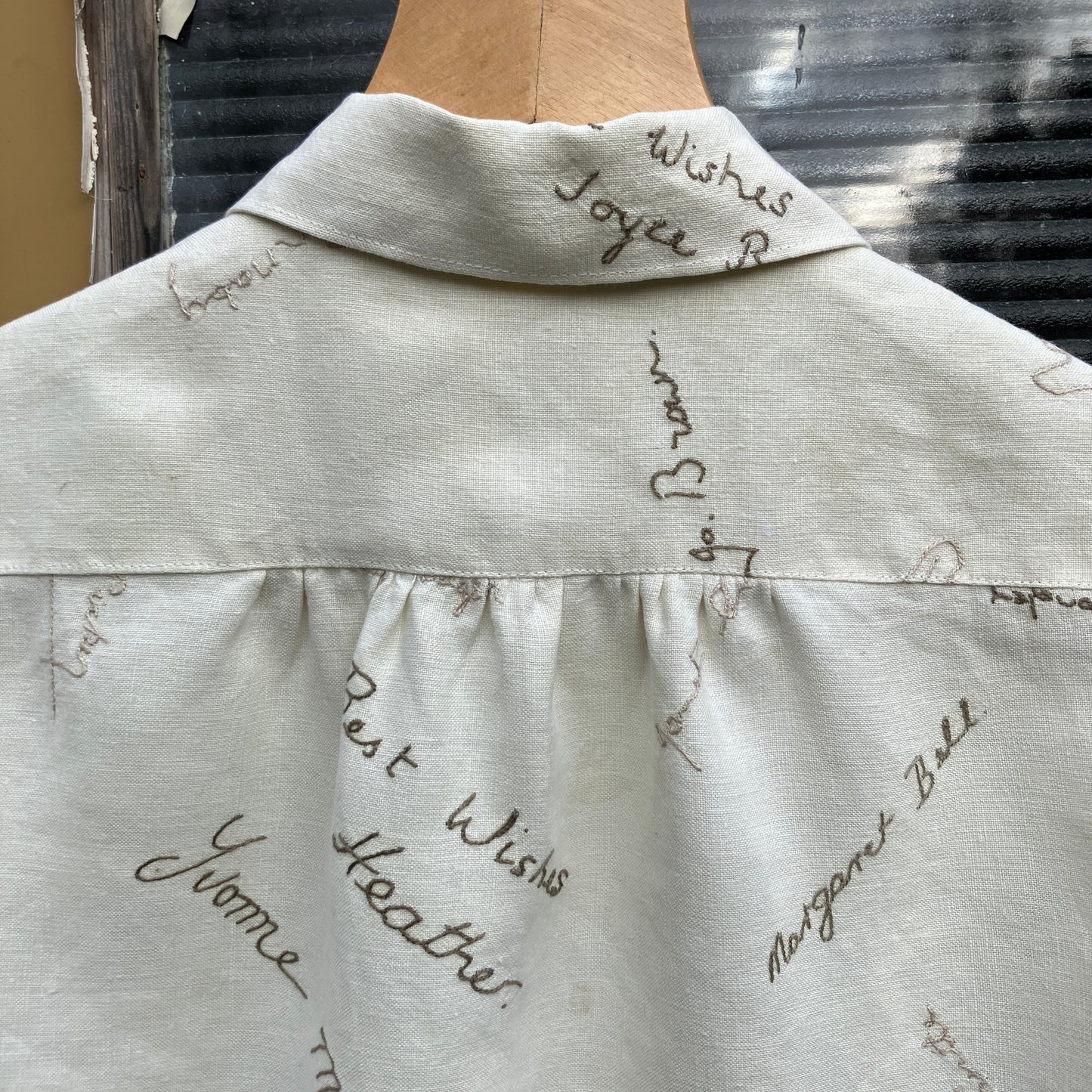 Linen shirt made from a vintage tablecloth hand embroidered with signatures and good luck messages