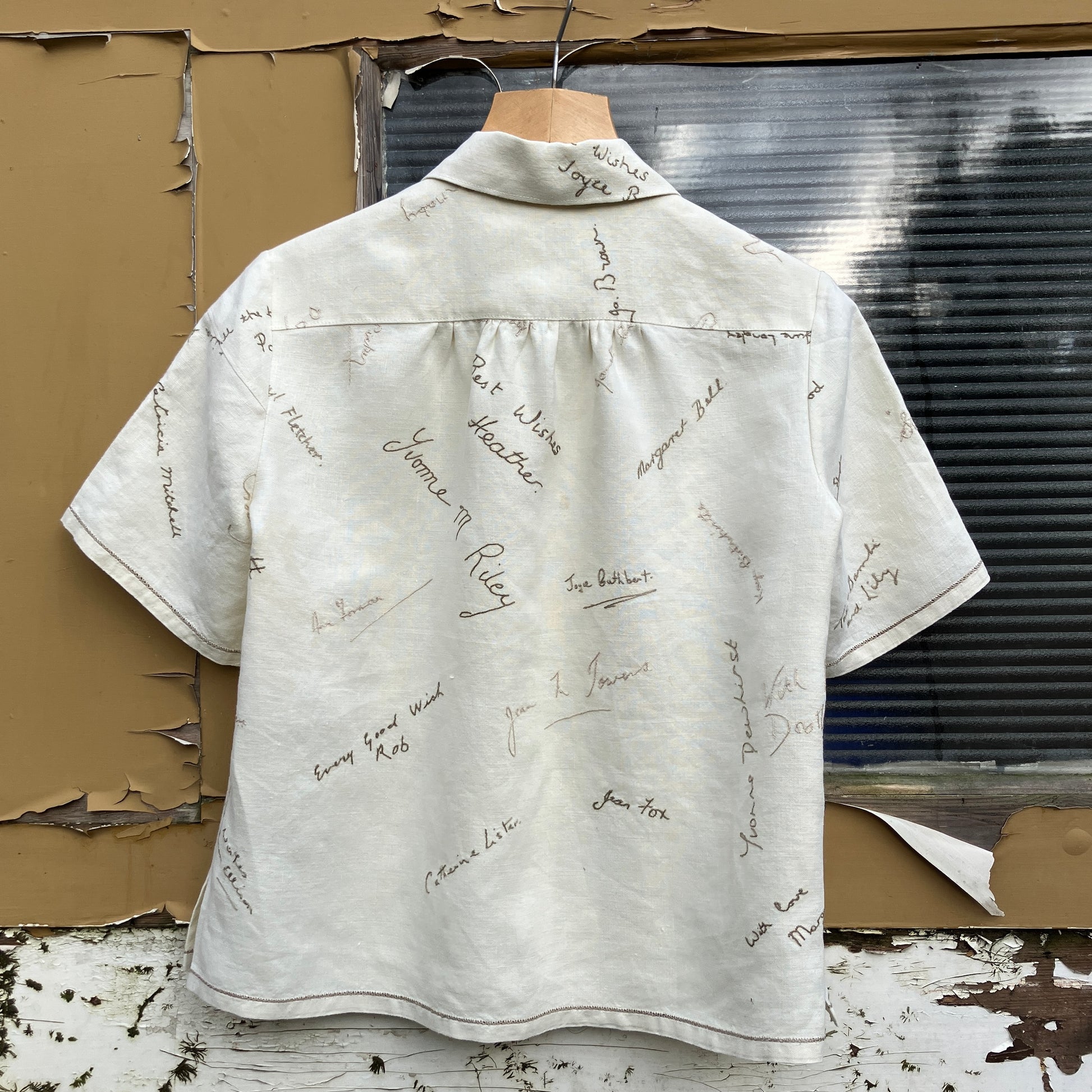 Linen shirt made from a vintage tablecloth hand embroidered with signatures and good luck messages