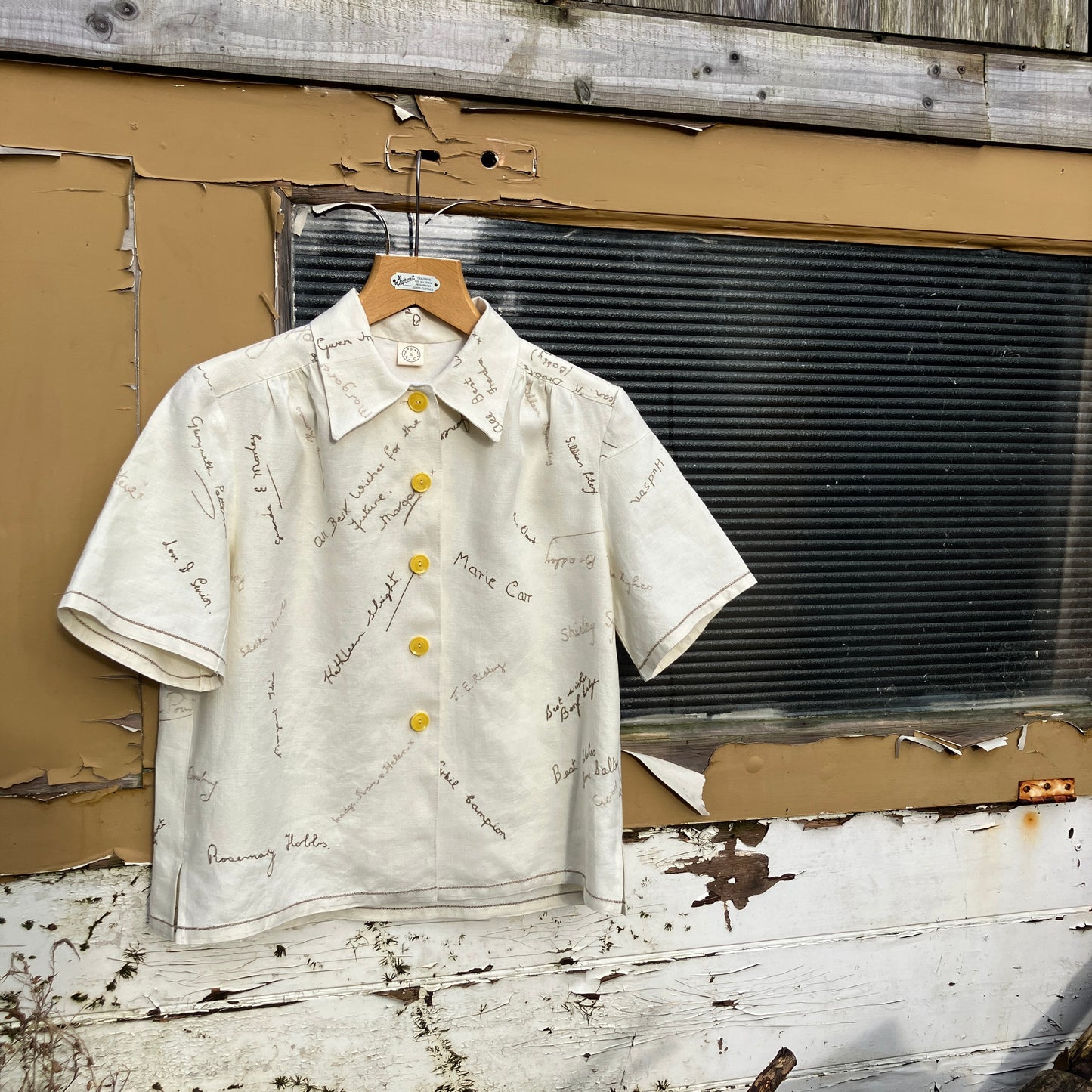 Linen shirt made from a vintage tablecloth hand embroidered with signatures and good luck messages