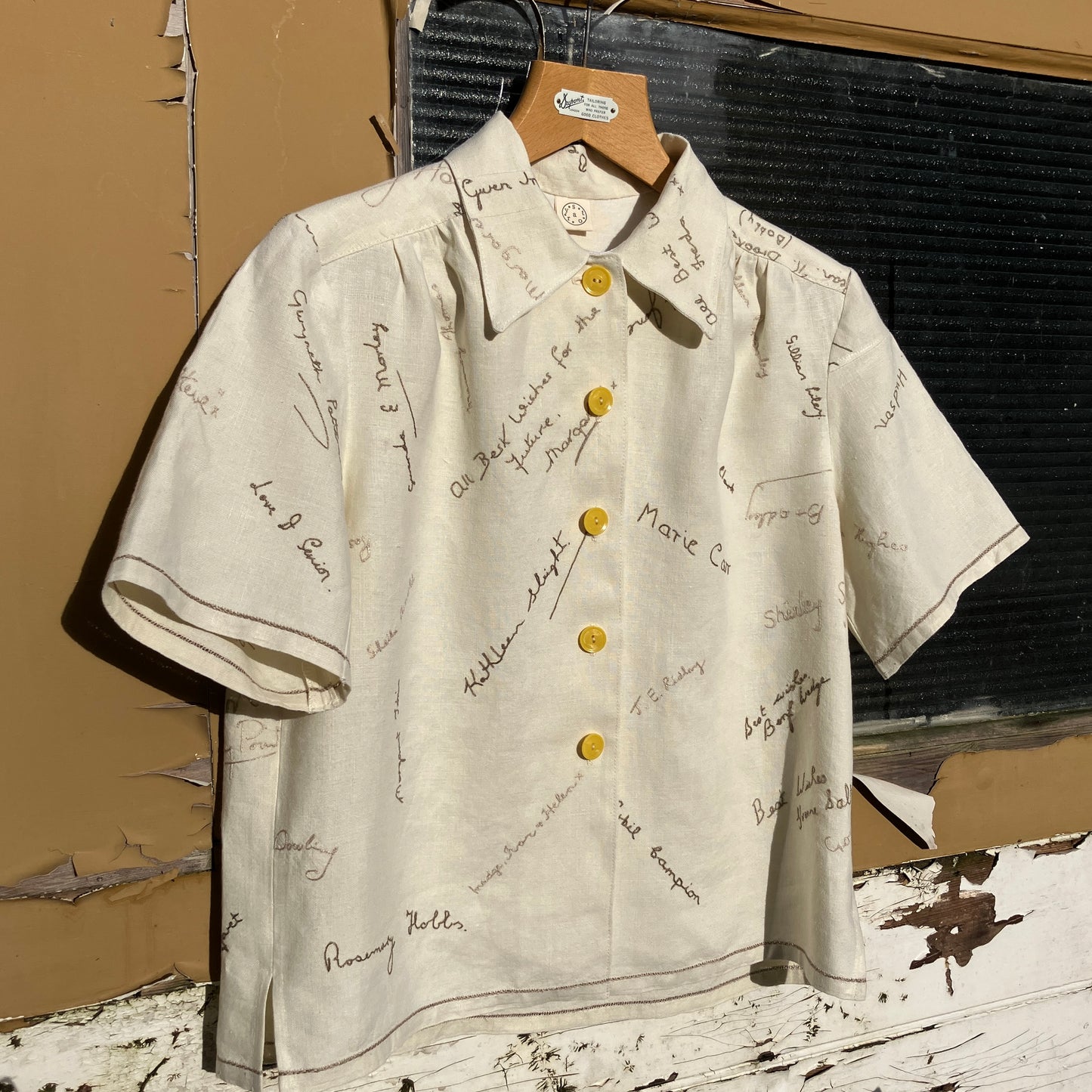 Linen shirt made from a vintage tablecloth hand embroidered with signatures and good luck messages