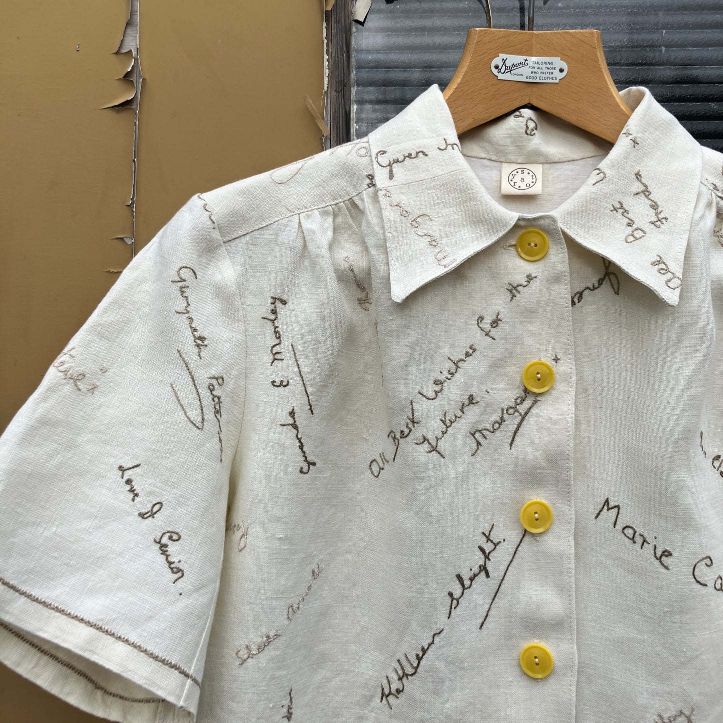 Linen shirt made from a vintage tablecloth hand embroidered with signatures and good luck messages