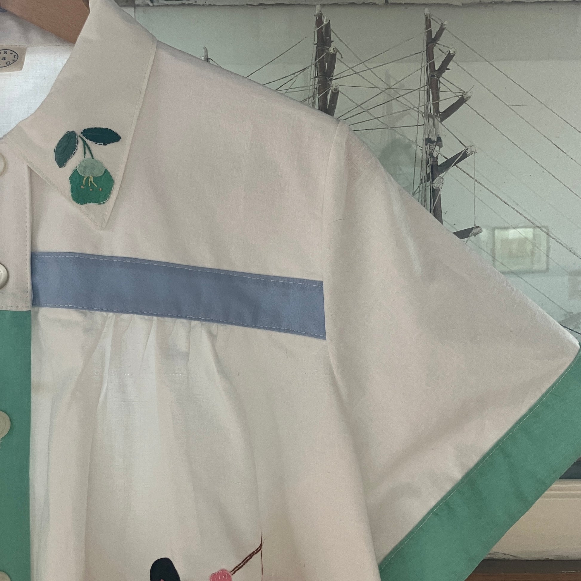 shirt made from reclaimed vintage pillowcases with two appliqué ladies