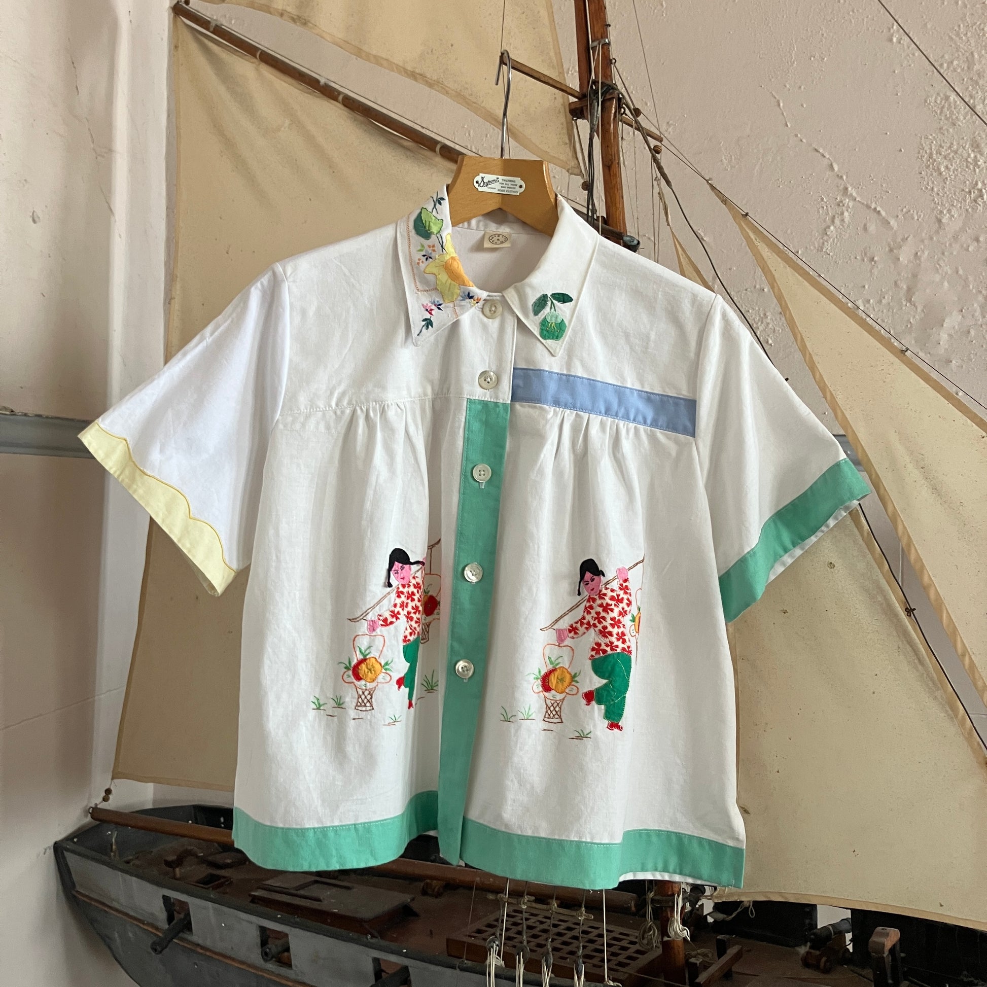 shirt made from reclaimed vintage pillowcases with two appliqué ladies