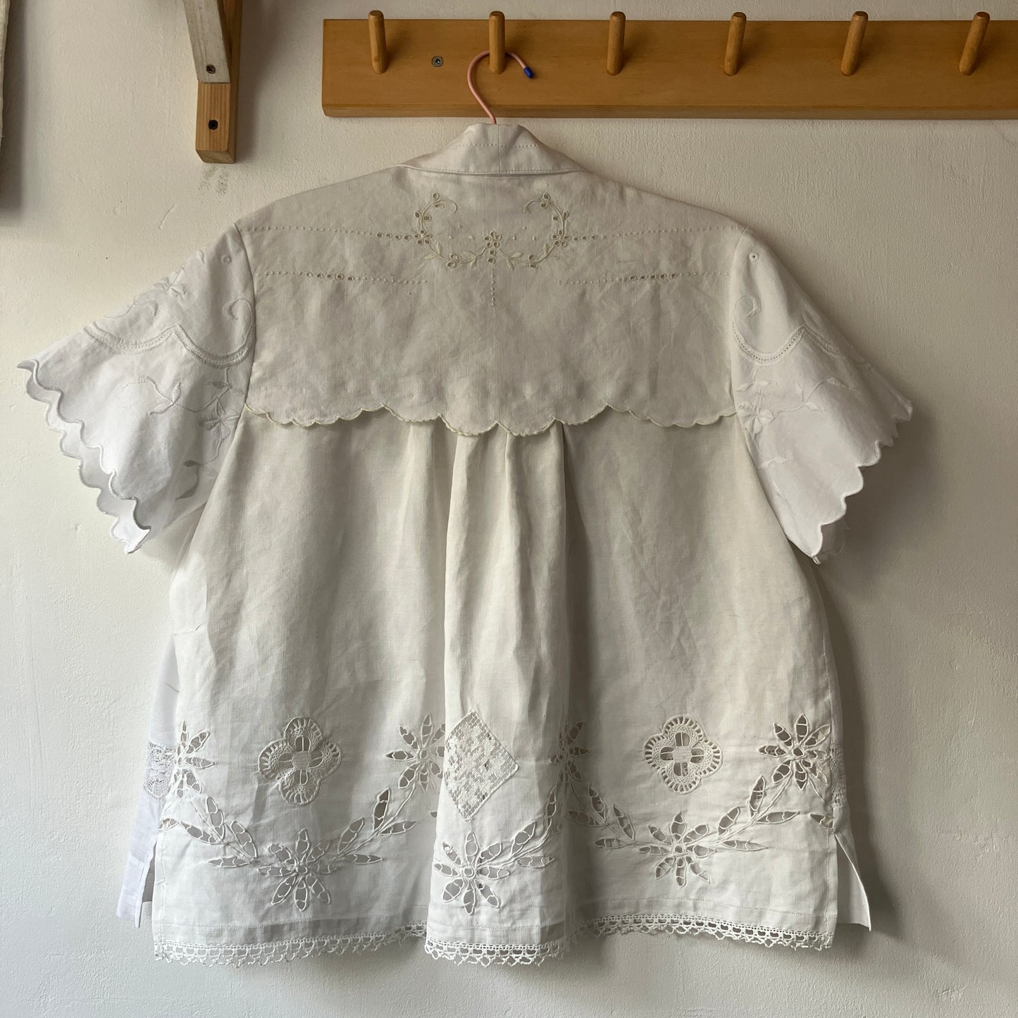 Short-sleeved white swingy shirt made from vintage cutwork linen and cotton cutwork table and tray cloths.